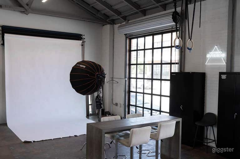  Photo of wall A at the studio with a white backdrop 