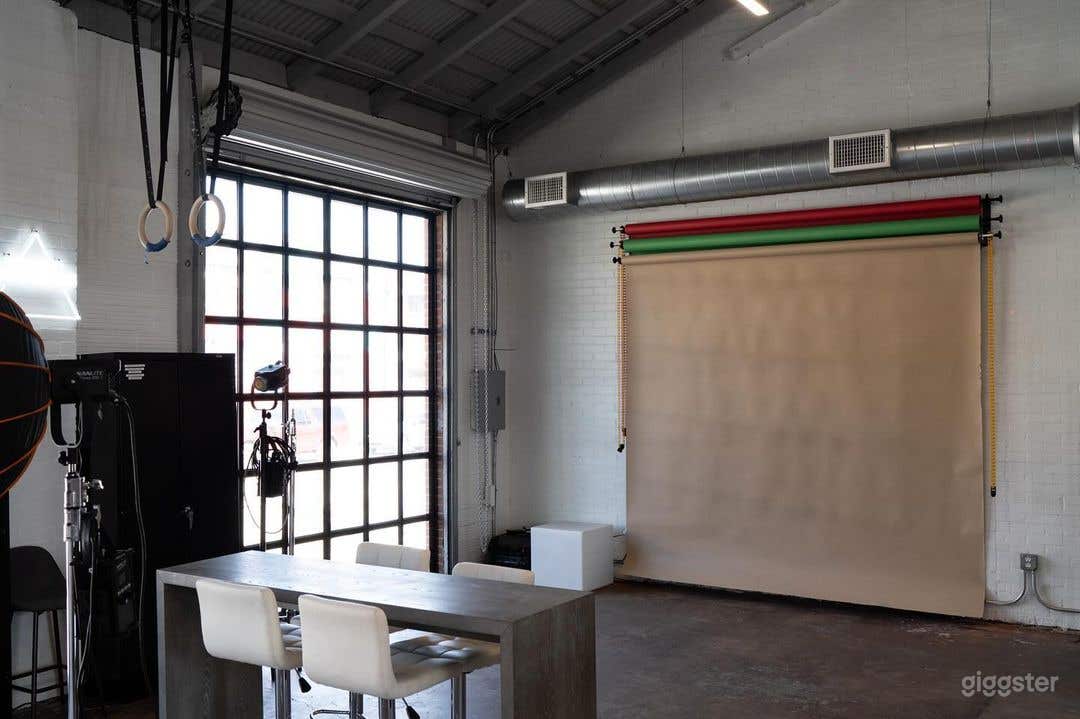 Photo of wall B at the studio with a tan backdrop