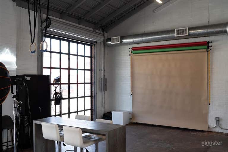  Photo of wall B at the studio with a tan backdrop 