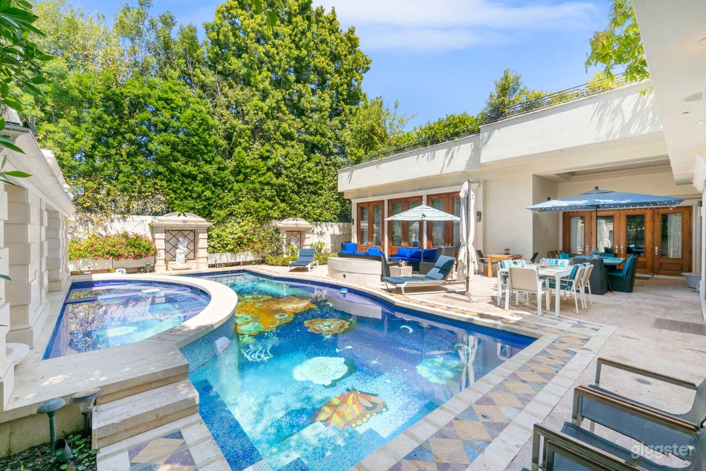 Luxurious Swimming Pool with Lounge Area Photo 1