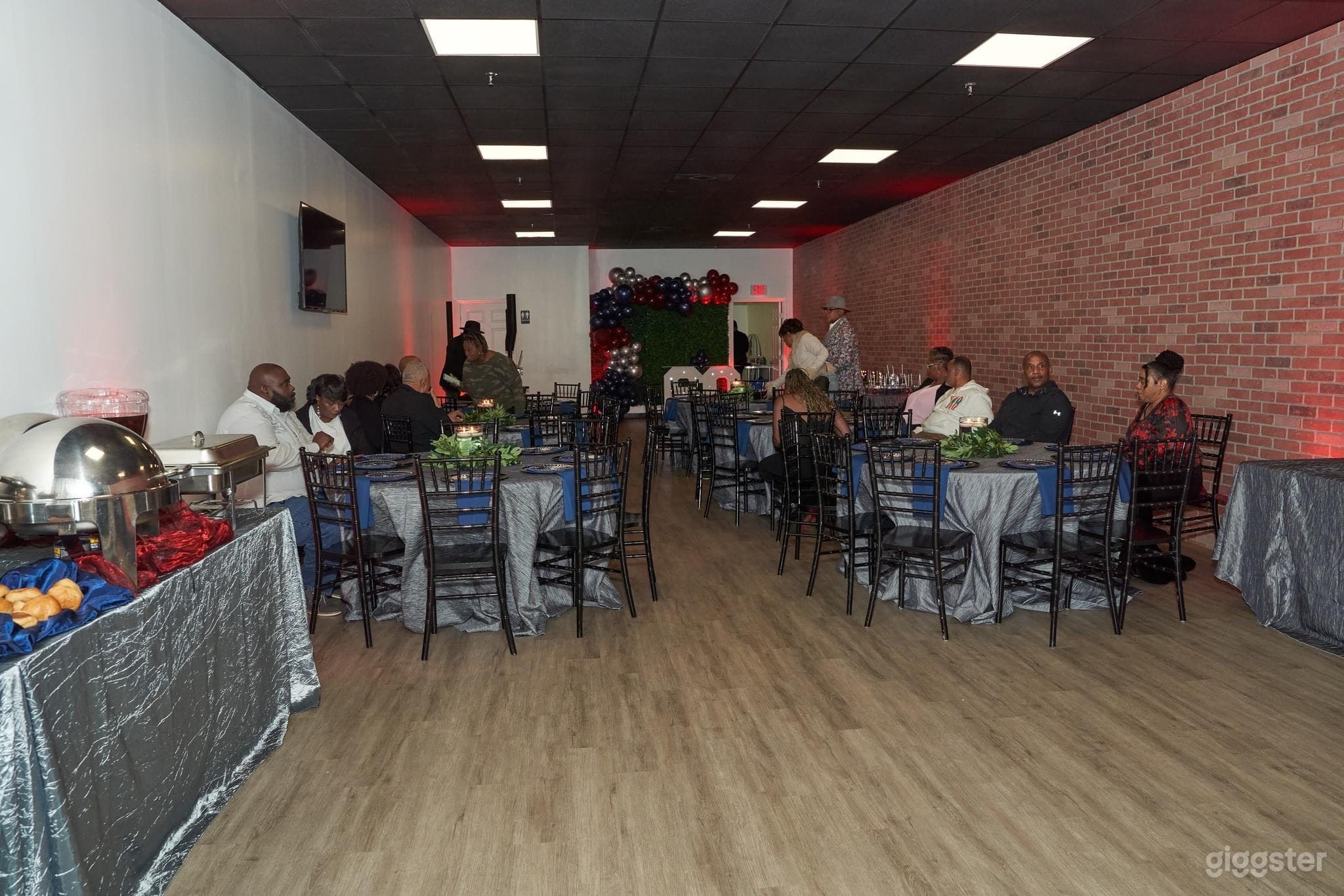 Event/studio space w/brick wall, black ceiling Photo 4