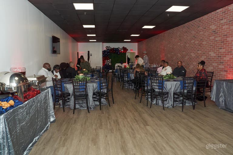  Event/studio space w/brick wall, black ceiling 