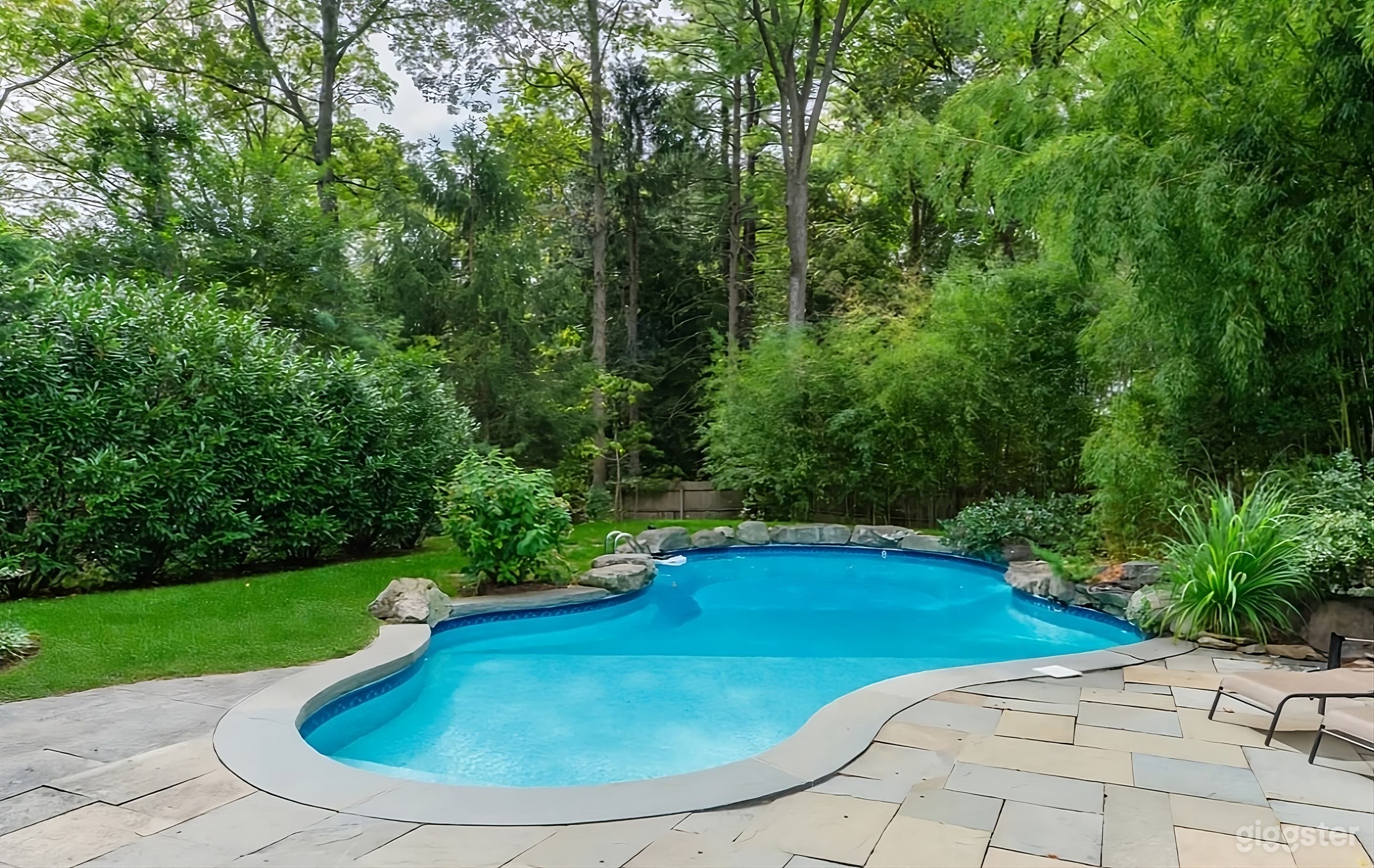 Secluded and Spacious Backyard Photo 1