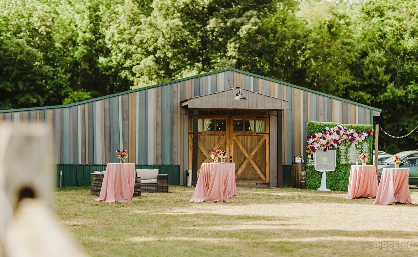 Charming striped barn venue.  Full-X Wood Carriage Doors.  Parking in adjacent field.
