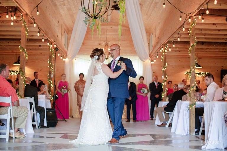  Inside of Venue...wood ceiling with drapes, lights, and chandeliers. 