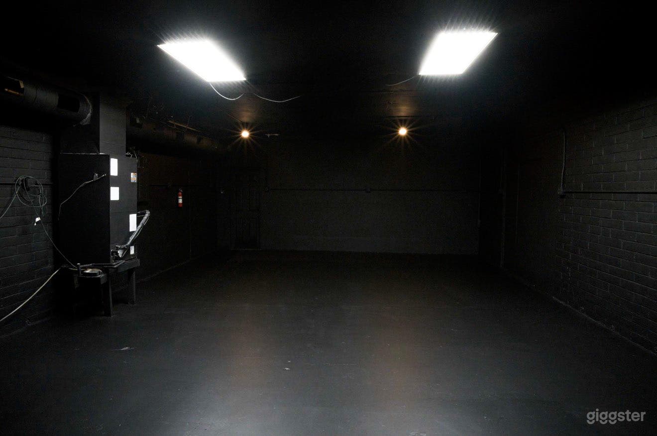 Blacked Out Warehouse Space With Front Loft Style Bedroom Photo 3