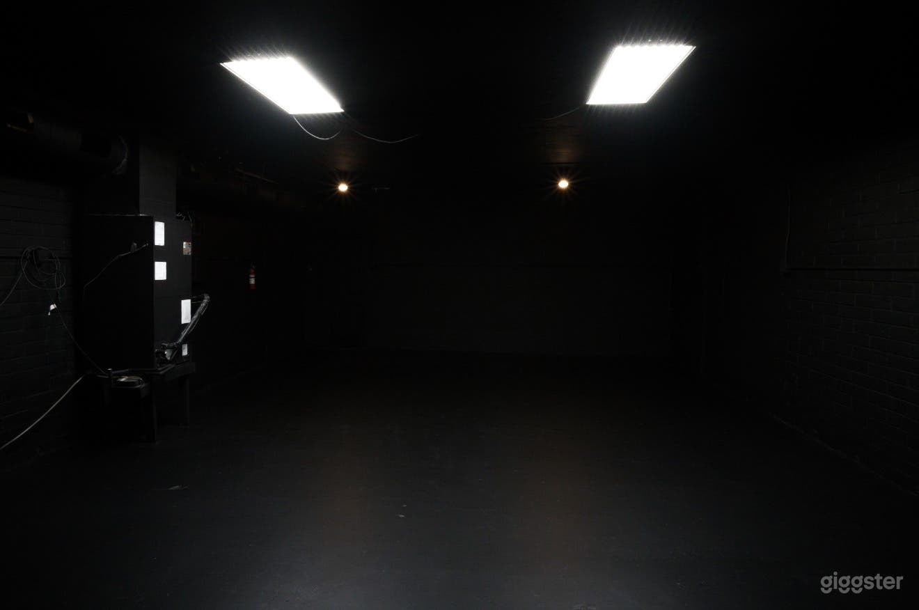 Blacked Out Warehouse Space With Front Loft Style Bedroom Photo 4