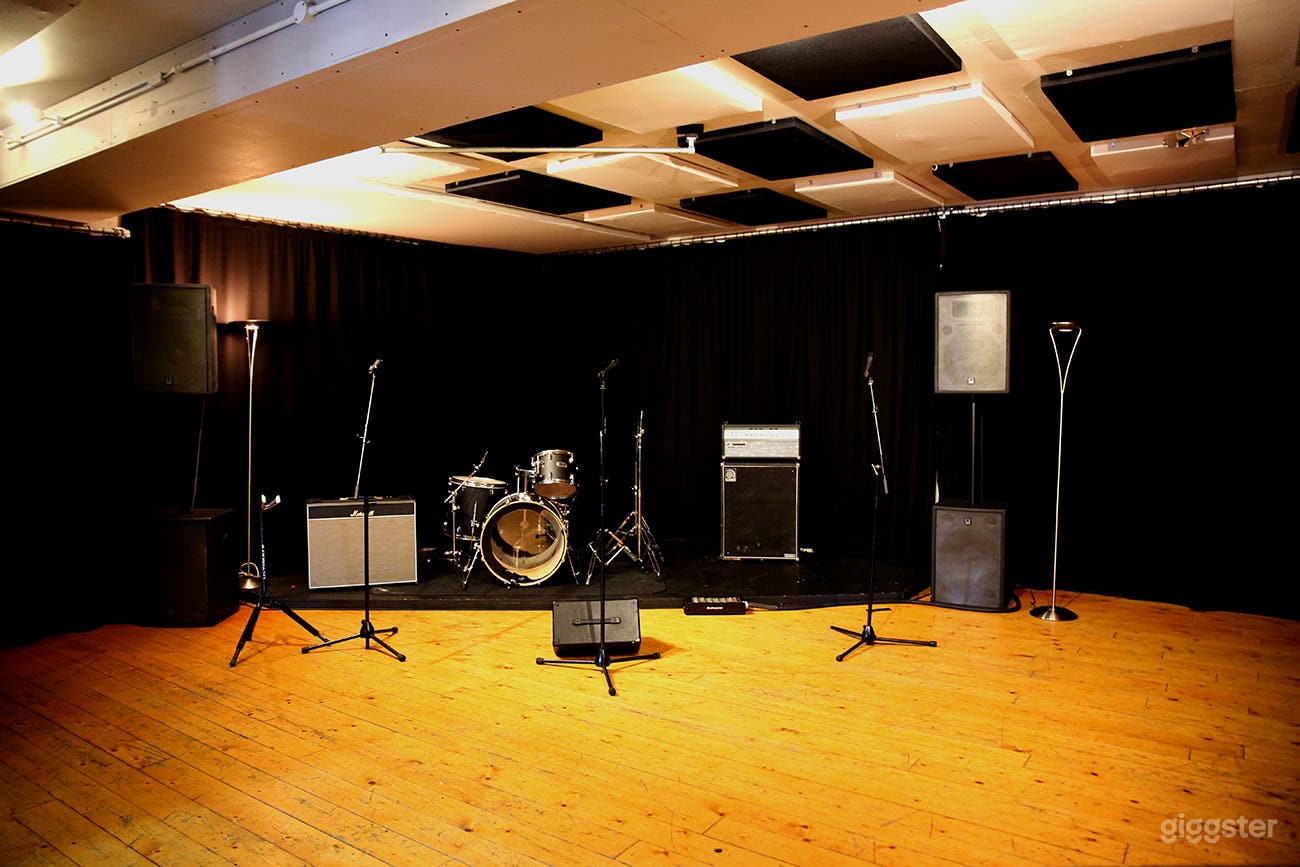 Large pre-production music studio with serge wool draping. Sound proofed. 