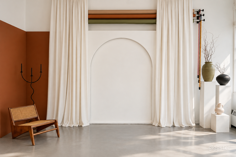  Living Room including wall-mounted arch with backdrops and props 