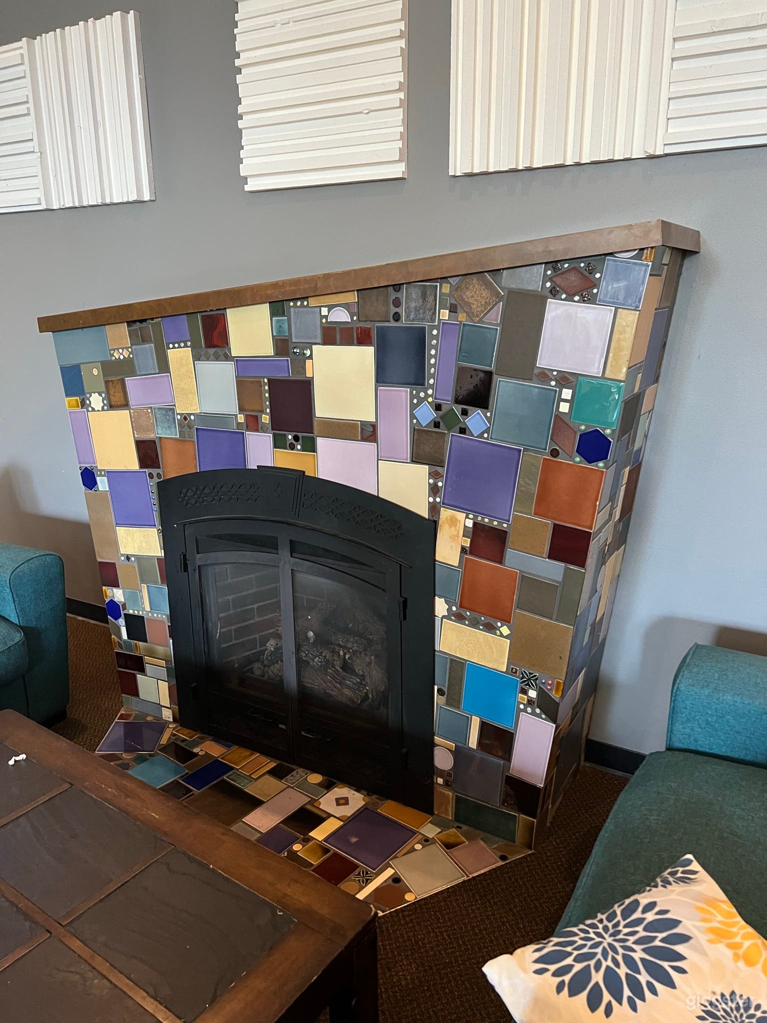 Art deco fireplace in youth room with tall ceilings