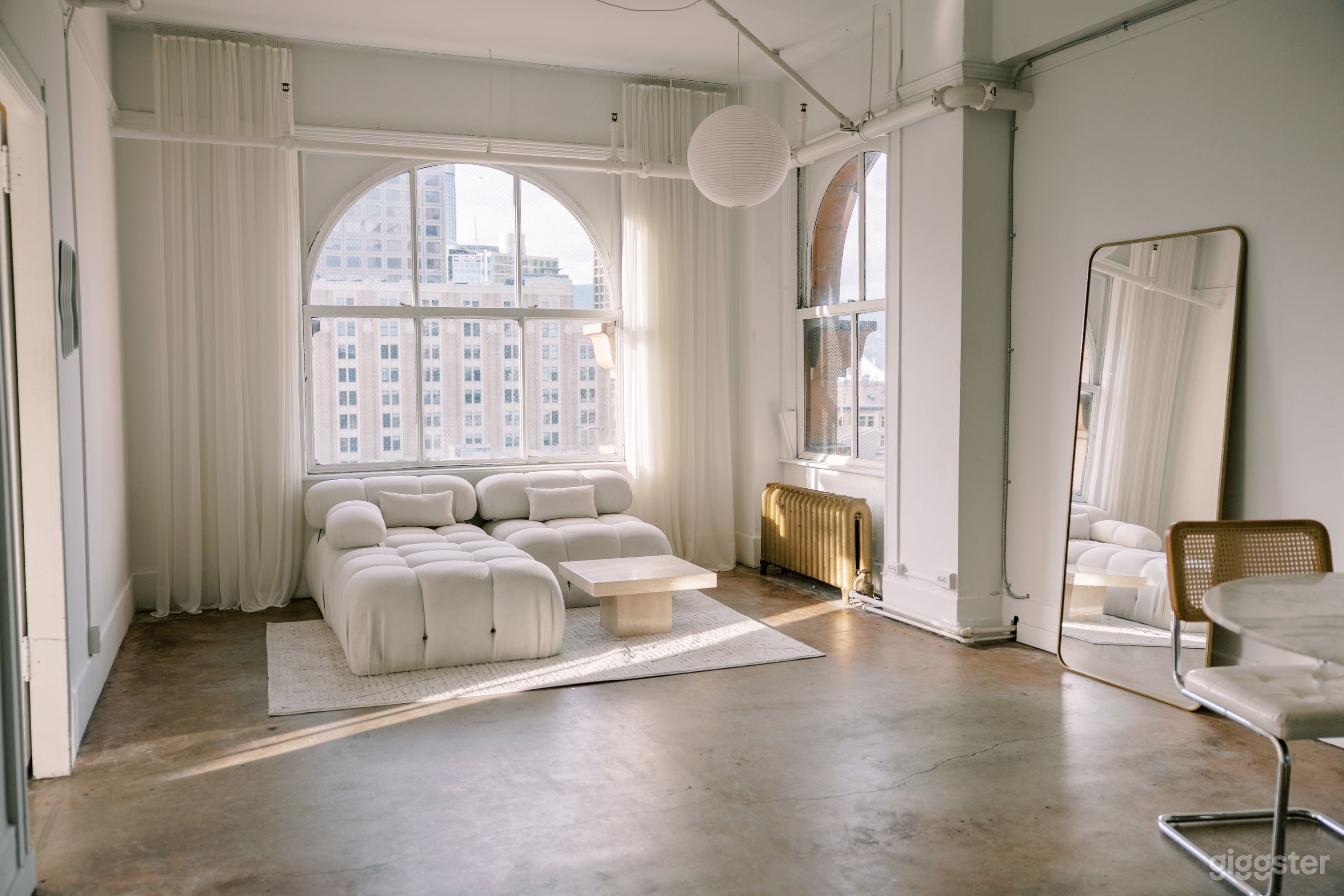 white bellini style couch in evening light