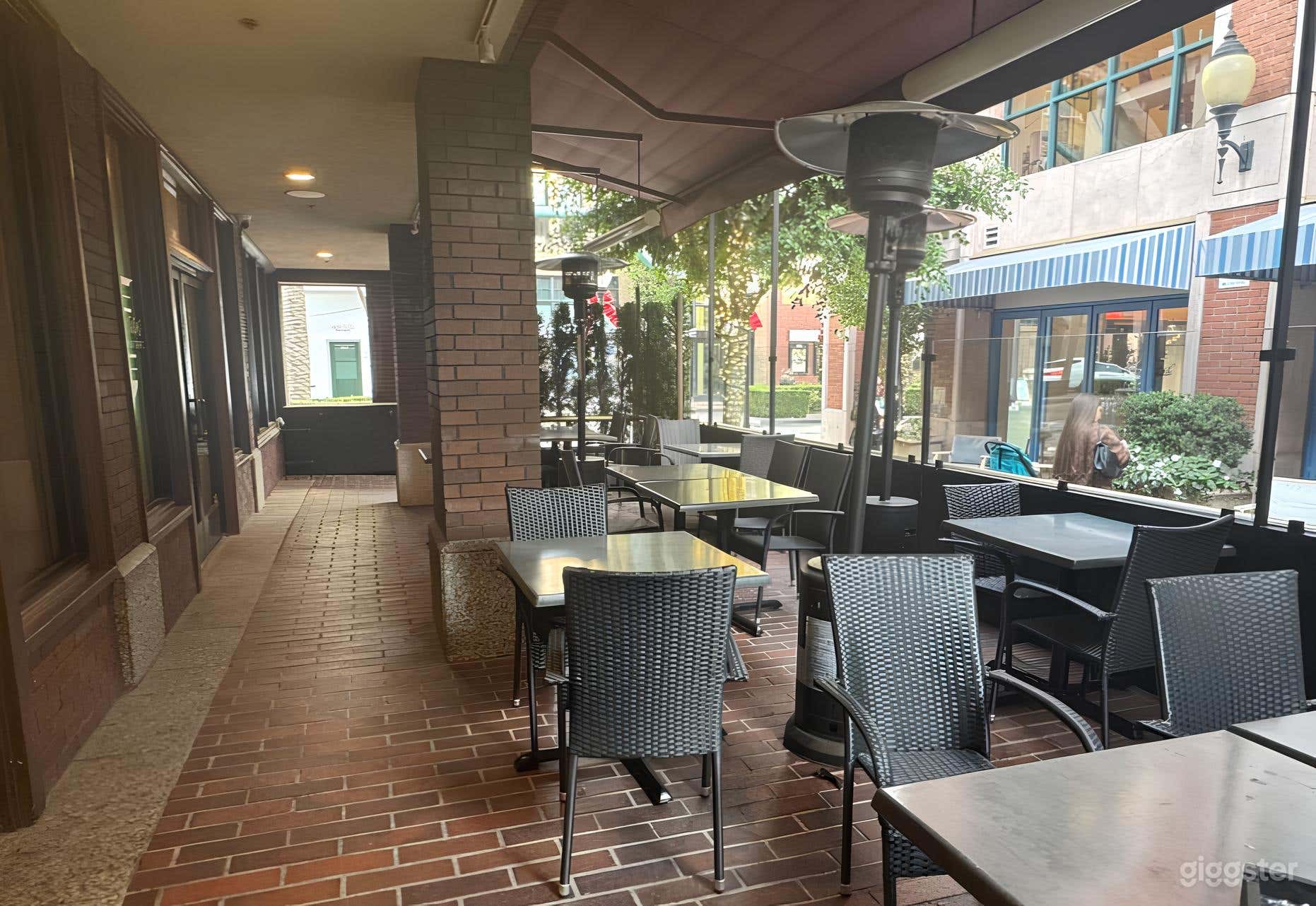 Cozy Bricklined Outdoor Patio for Productions  Photo 1