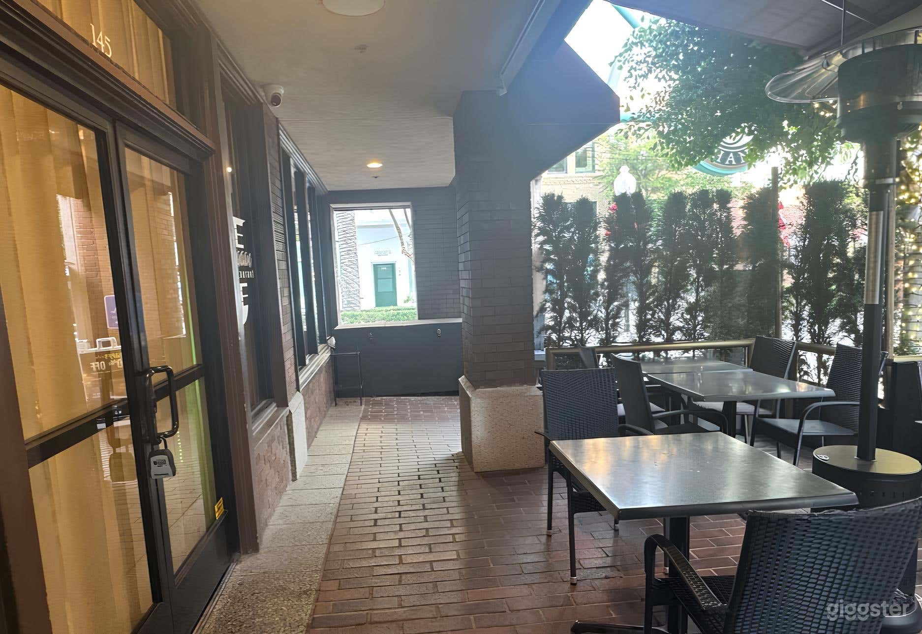 Cozy Bricklined Outdoor Patio for Productions  Photo 4