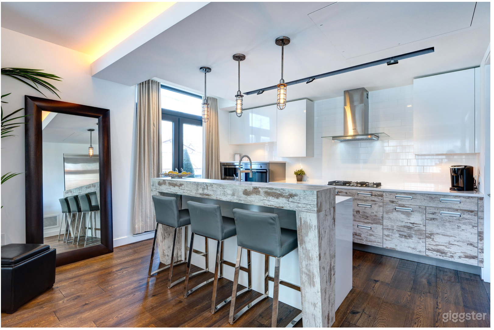 Open Concept Kitchen with Juliette balcony. Gas stove. Breakfast counter. 