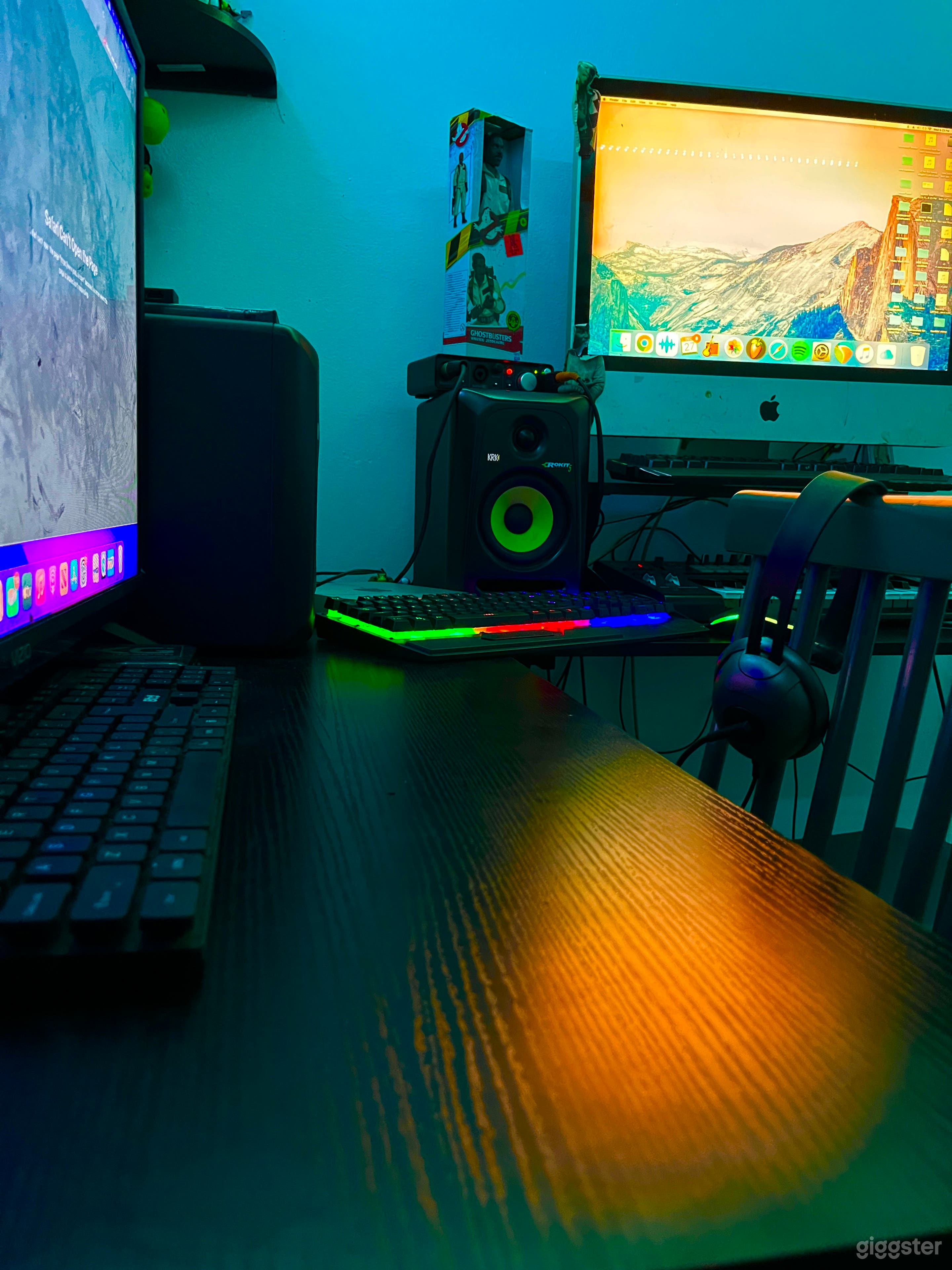 Two computers equipped for audio recording &amp; video editing.