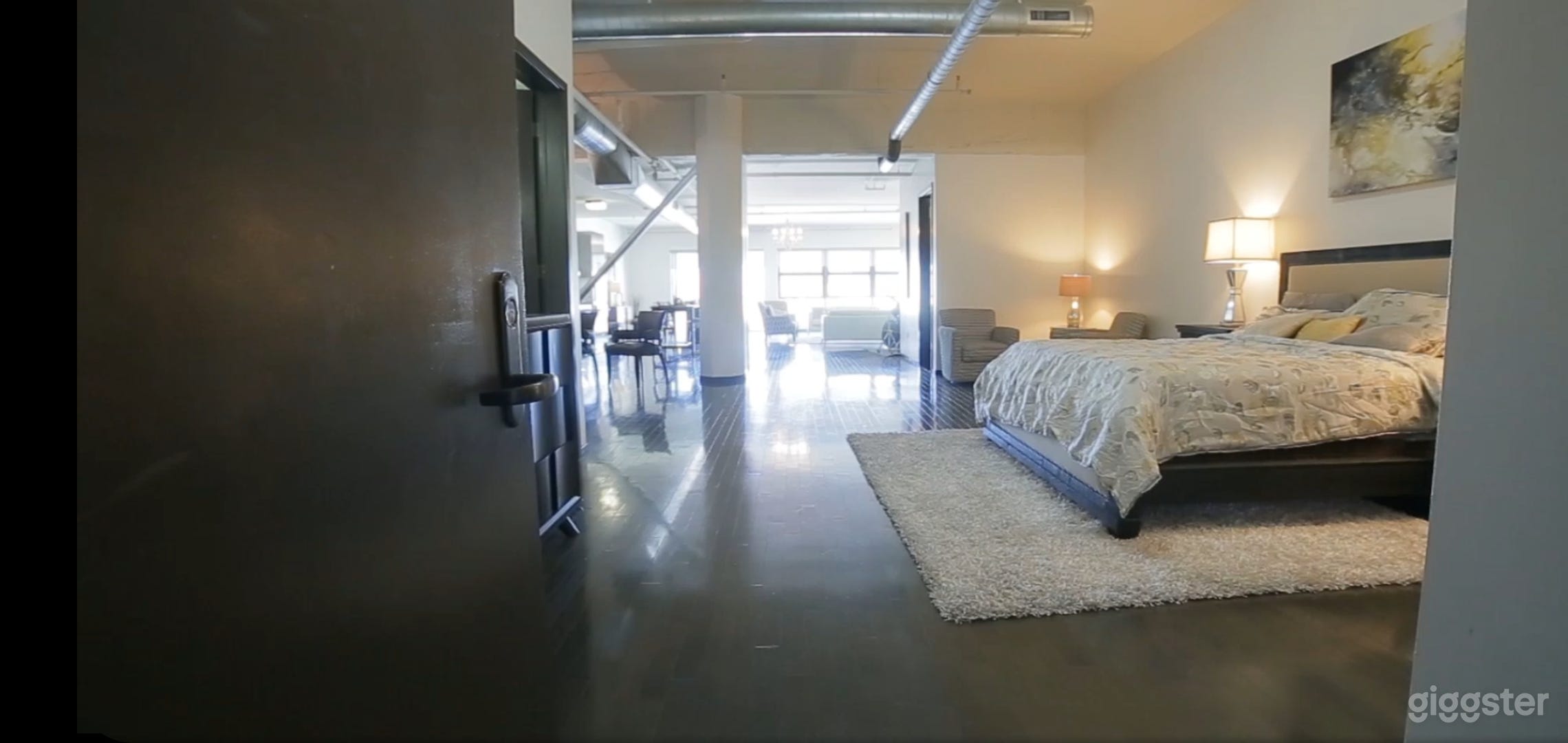 Open 2000 sq ft penthouse loft with floor-to-ceiling windows and breathtaking romantic and panoramic city skyline views