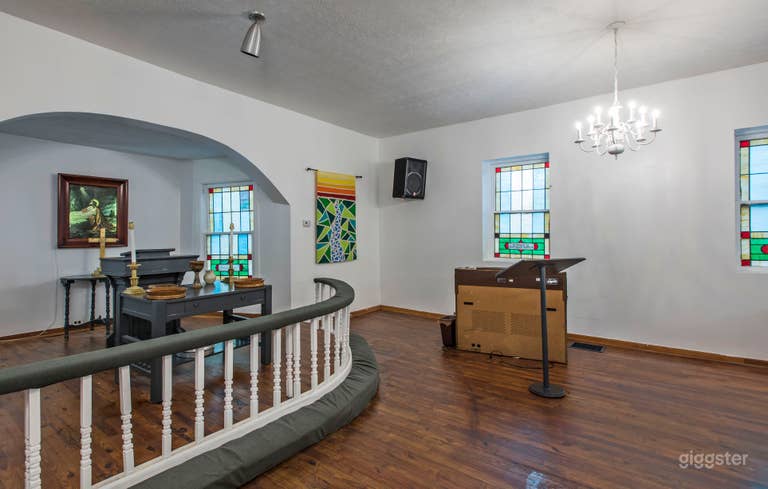  a roomy front and a prayer rail set off this stage area. 