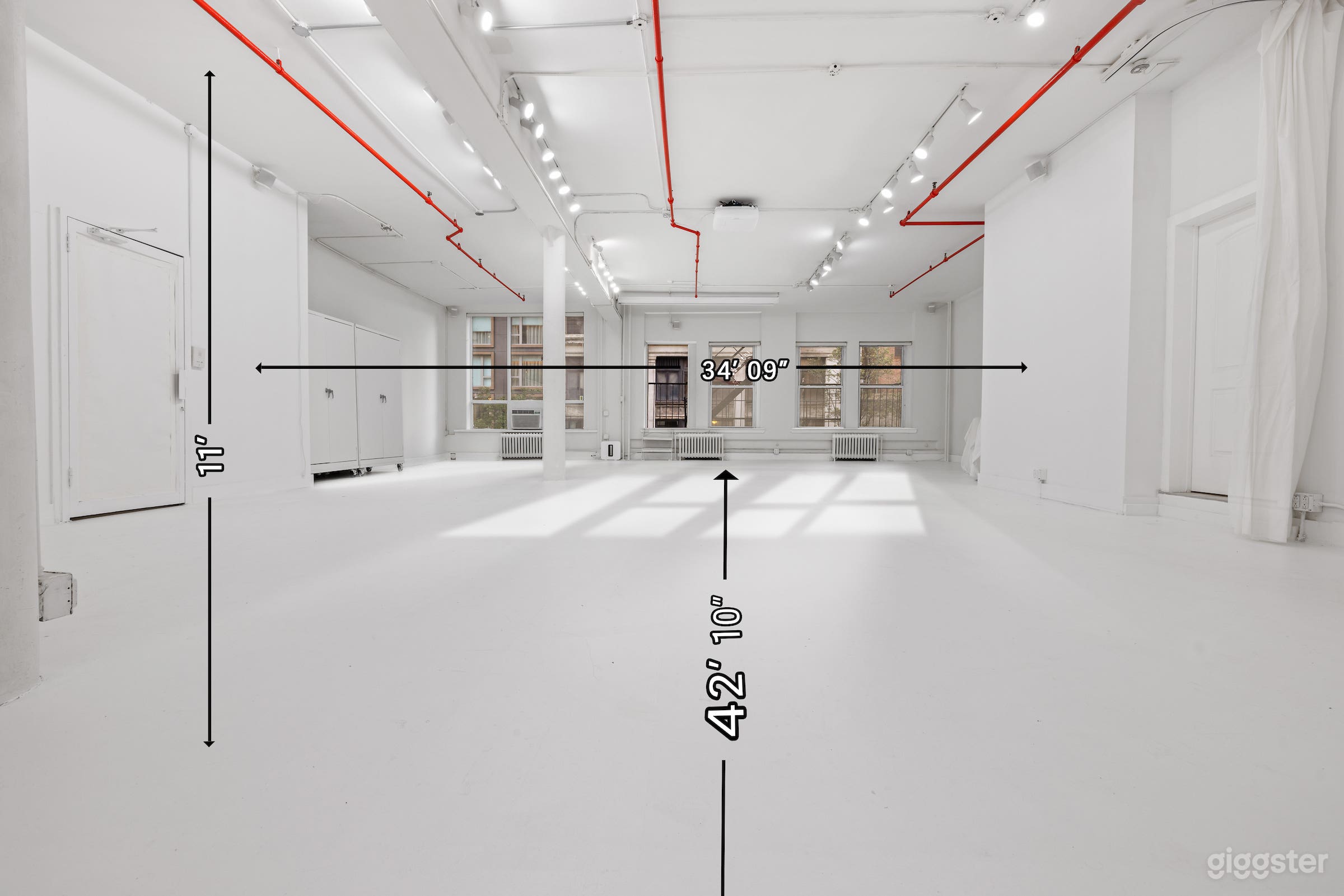 Southern exposure lightening, big white open space including pure white floors, walls &amp; ceiling.