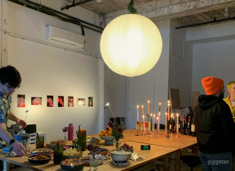  Our big tables allow guests to set up plenty of food and props as well as white walls for any gallery showings like this! 