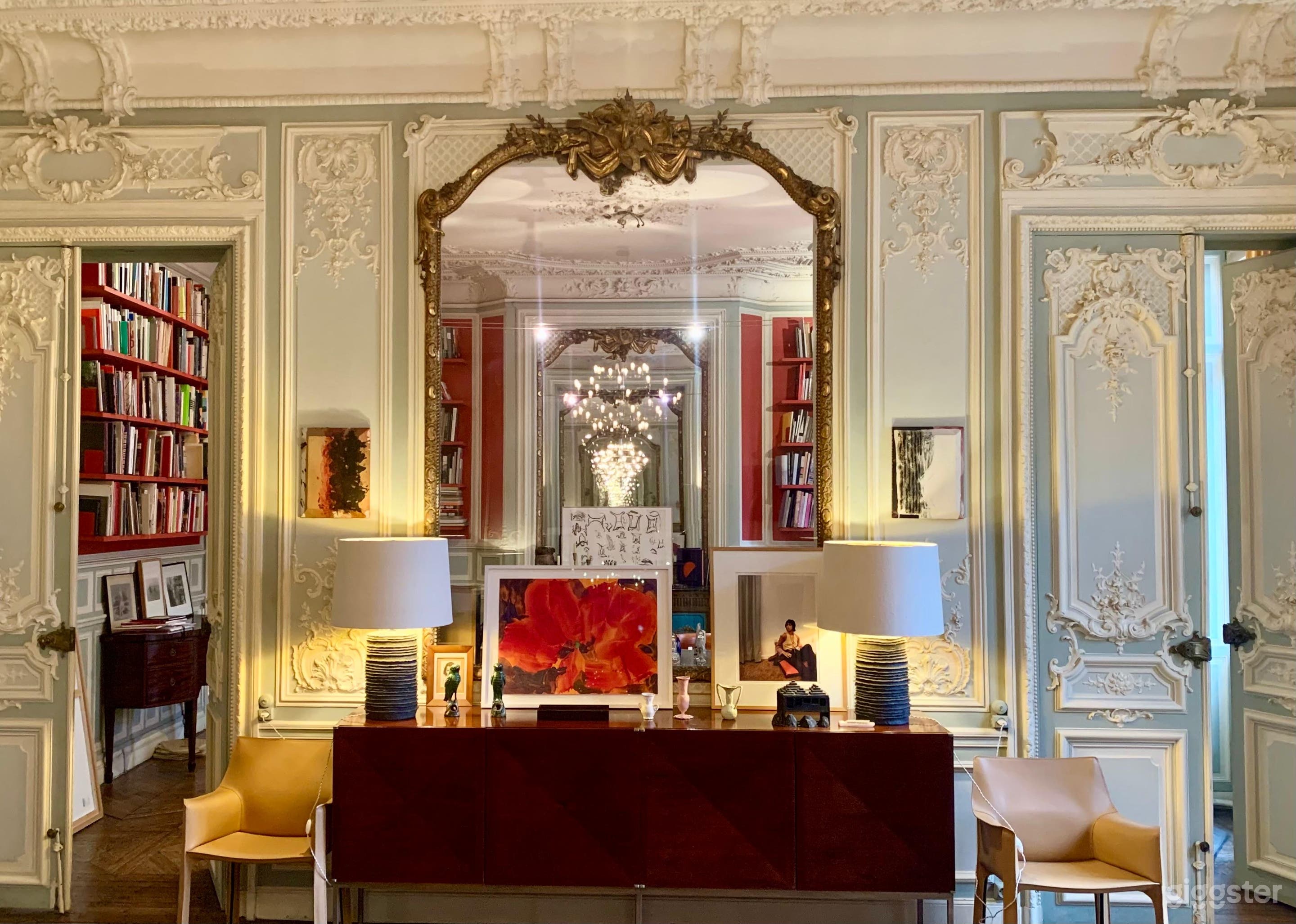View from Living Room to Dining Room: A grand gilded mirror creates a mesmerizing infinity effect, offering a rare and visually captivating connection between the living and dining spaces.
