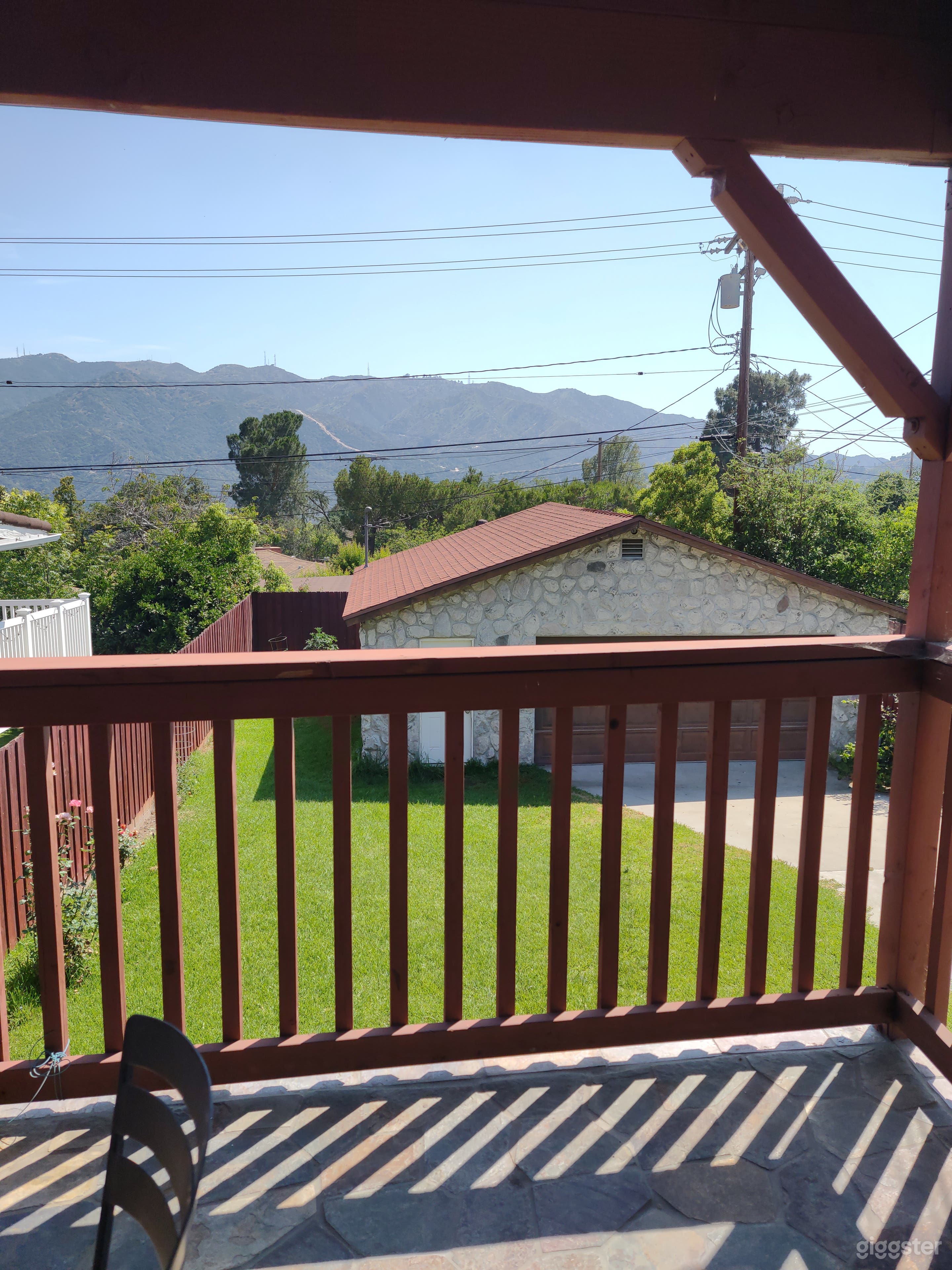 Balcony view and backyard.