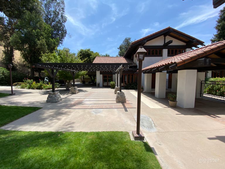  Lit Trellis and covered walkway to adjacent building Suite 