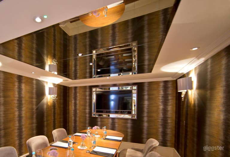  Enchanting Boardroom with Dramatic Silver Wallpaper in London  