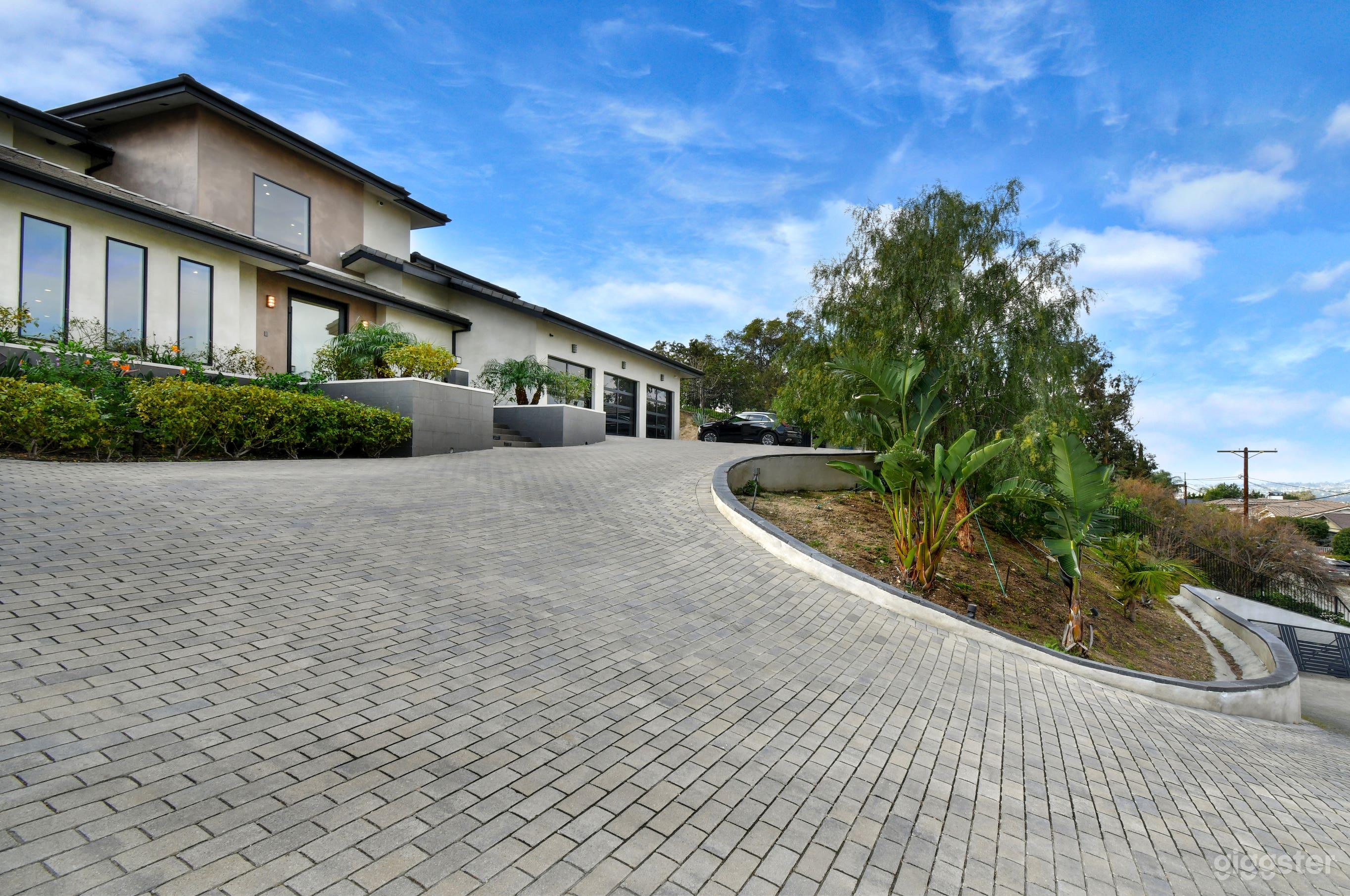 7,500+ Sq.Ft. Hillside Modern Luxury Mansion with EPIC Views Photo 3