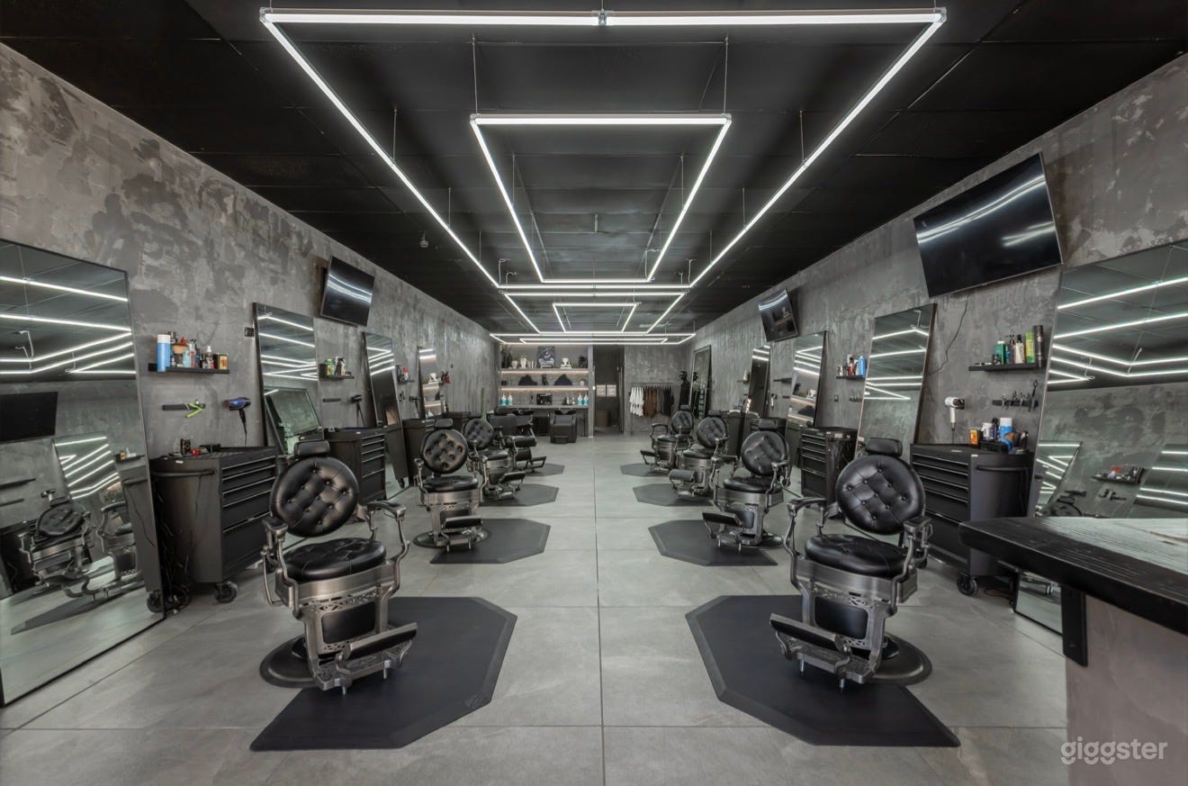 Geometric LED lighting, modern industrial textures, oversized mirrors, and a clean cinematic layout designed for productions, music videos, podcasts, interviews, fashion/editorial shoots, and social media content.

✔ 1,000 sq ft open layout  
✔ 6 barber stations  
✔ Production-friendly setup  
✔ Movable furniture  
✔ Multiple filming angles  
✔ Burbank location near major studios