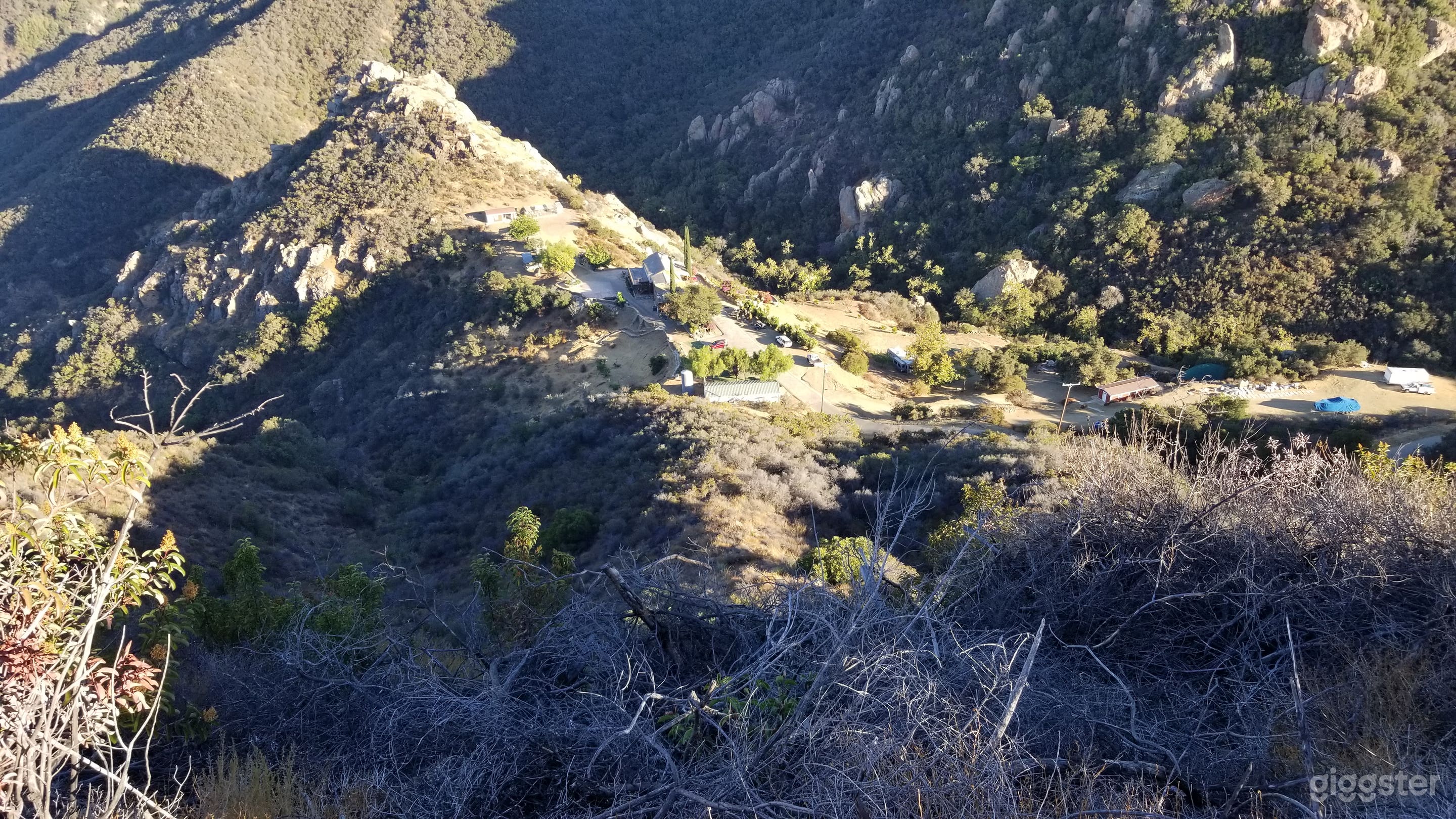 View of Main House and surrounding buildings and parking areas.