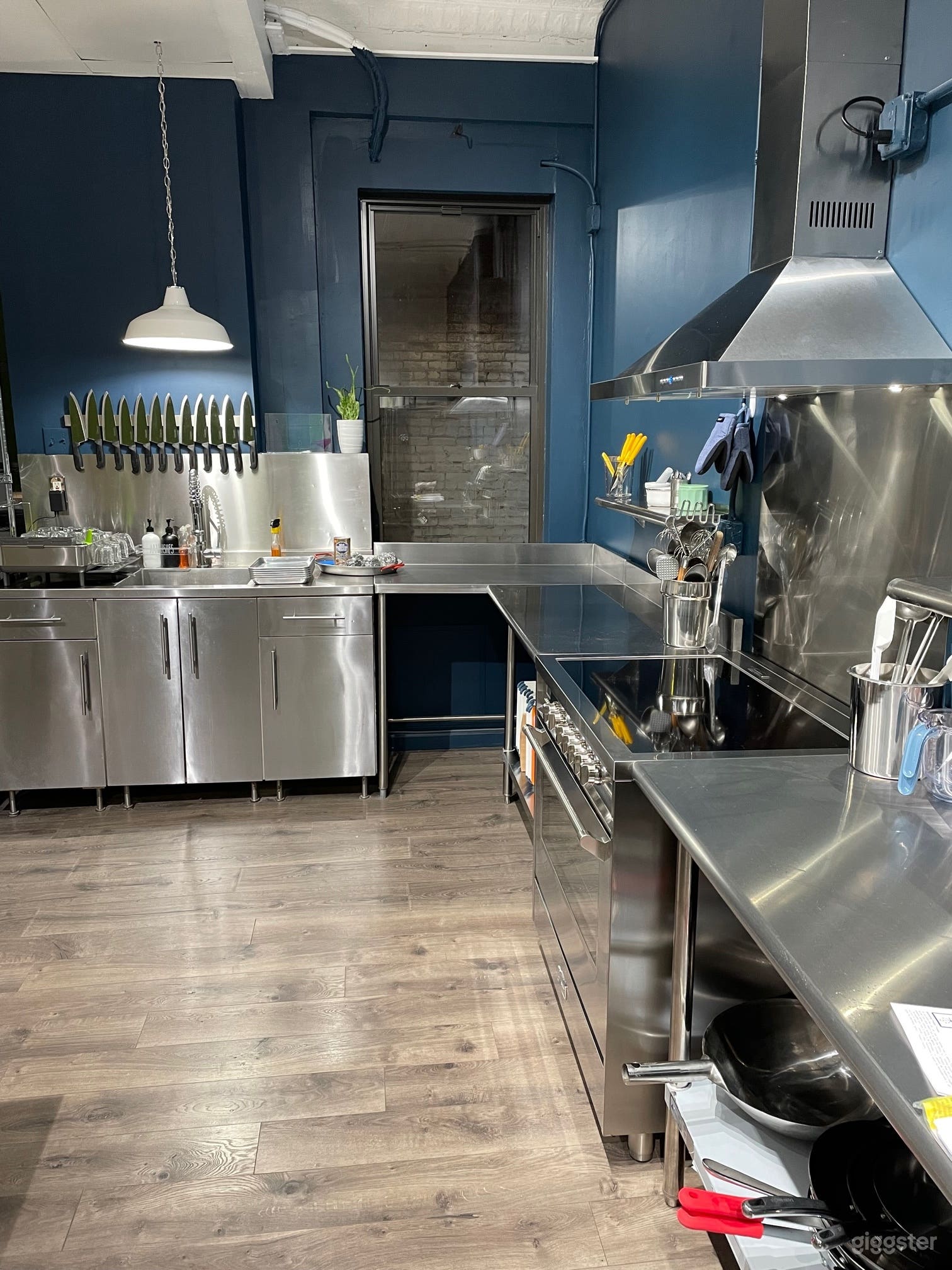 Full kitchen with commercial 36 inch induction range.