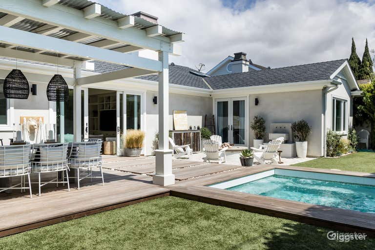  Serene Spool in an Elegant Beach House Setting 