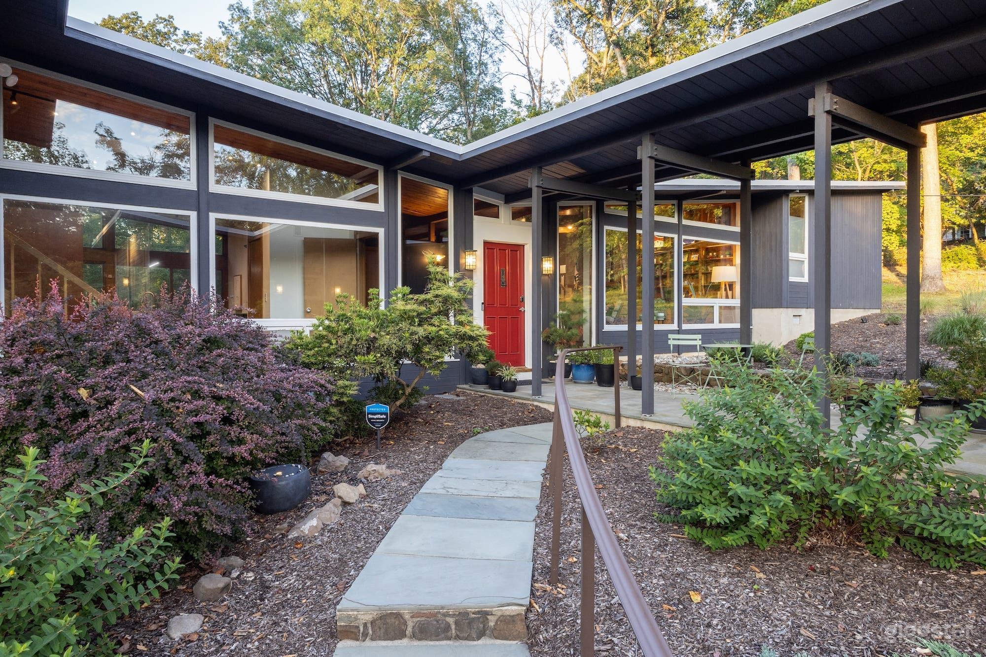 Dramatic entry with post &amp; beam walkway
