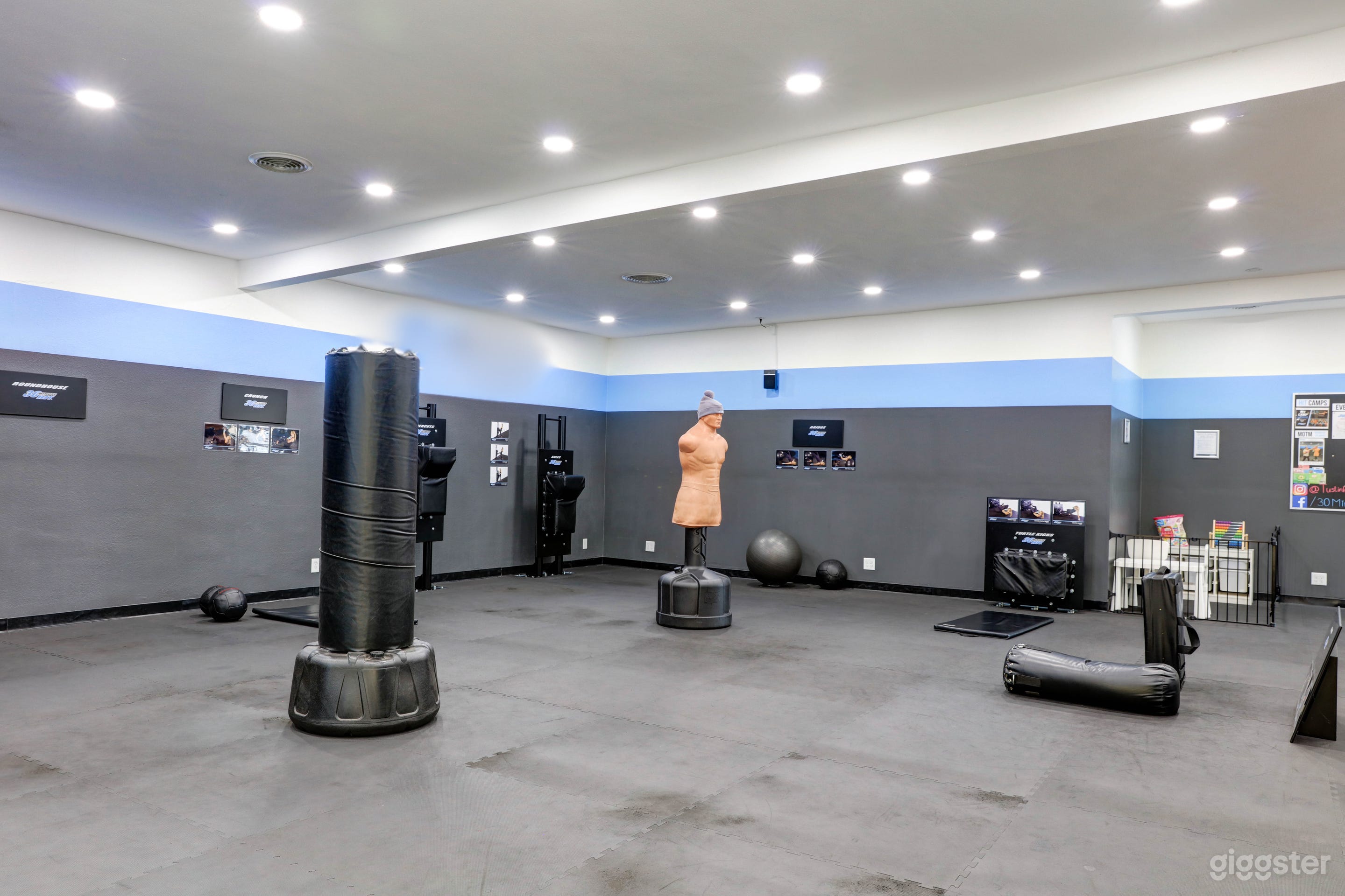 This is one portion of the workout floor which covers 1200 sq ft of the space. B.O.B. and Roundhouse bags can be moved to a different position or removed.