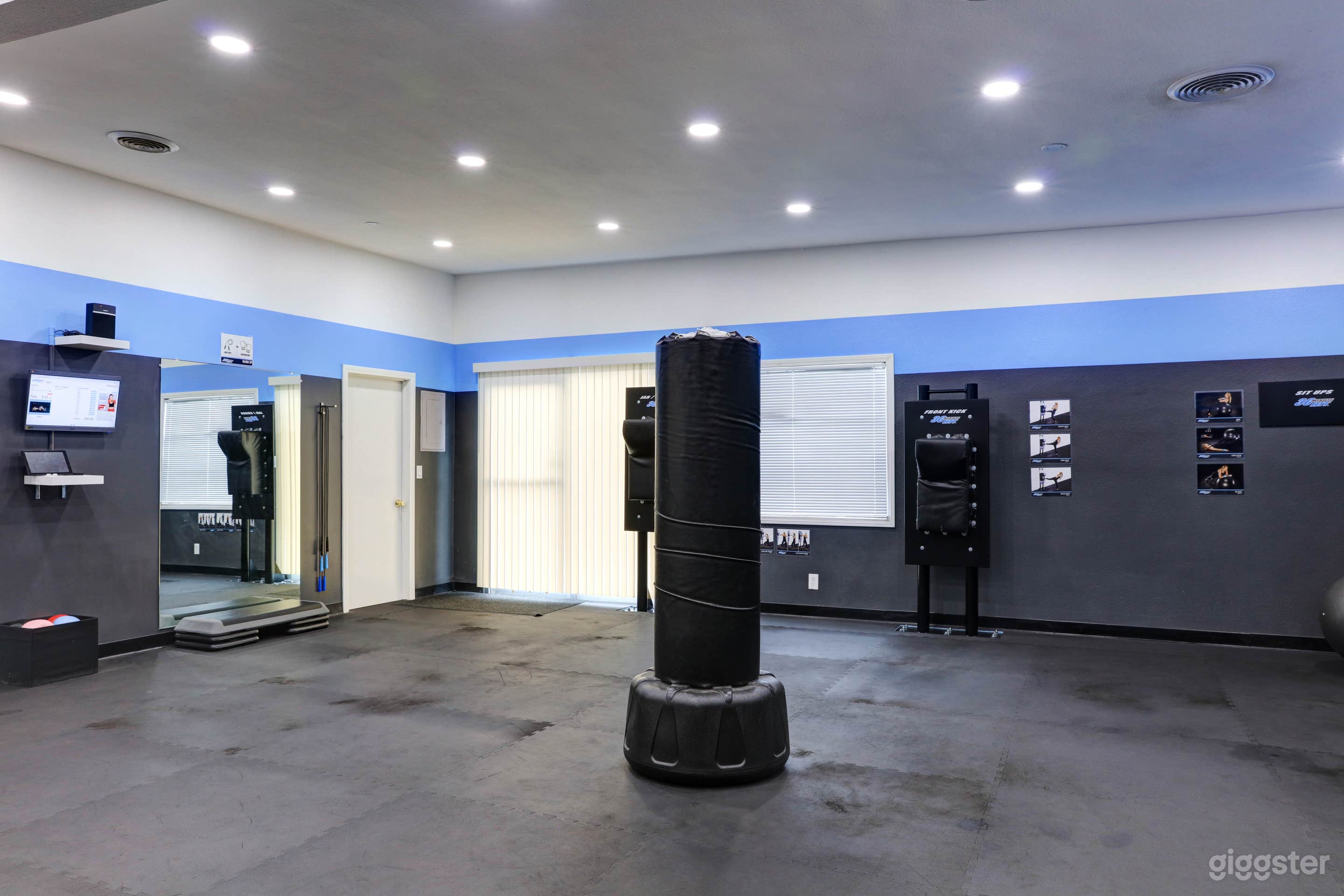 This is one portion of the workout floor which covers 1200 sq ft of the space. Roundhouse bag can be moved to a different position or removed.