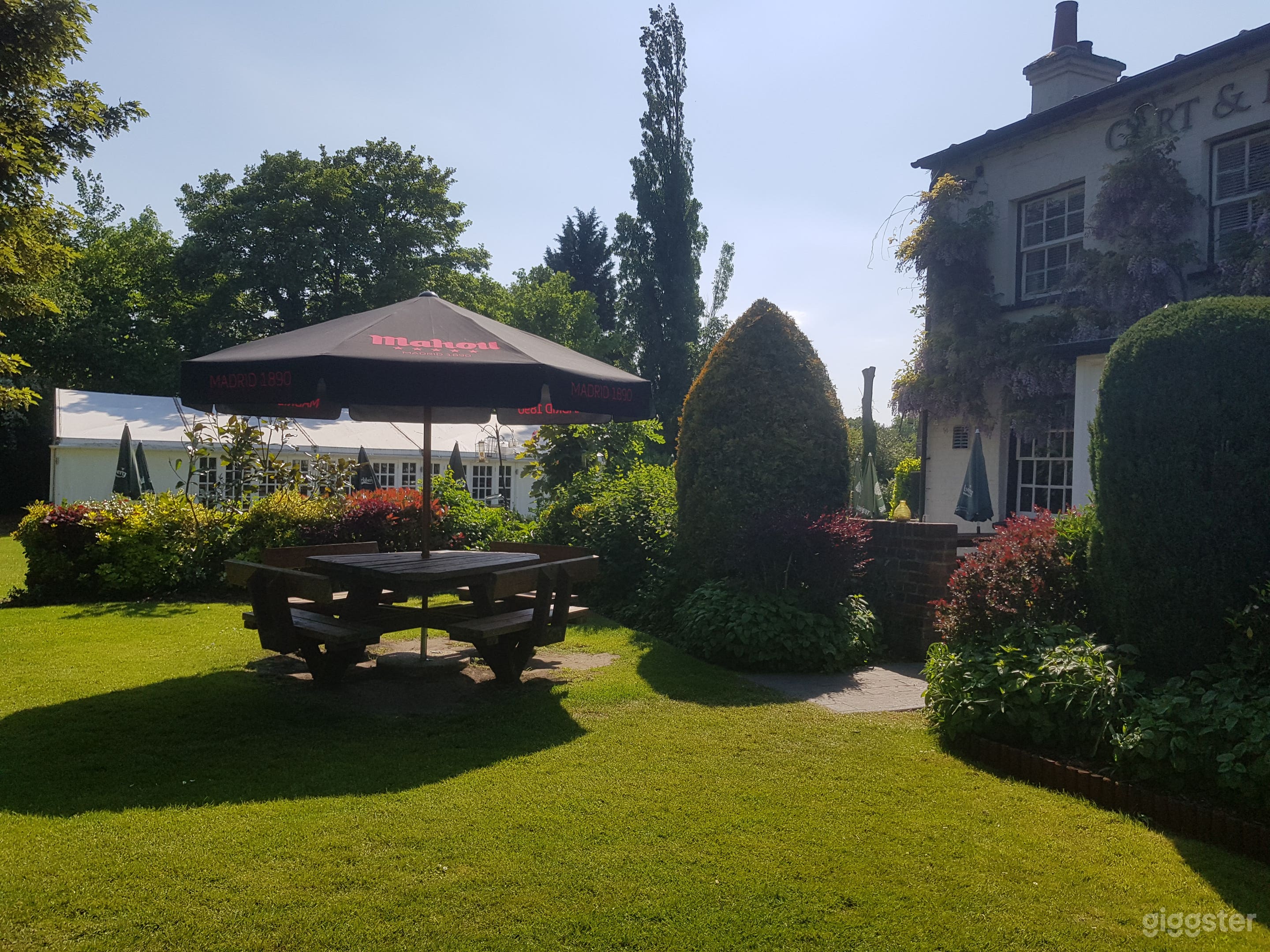 Extensive gardens with purpose built marquee with bar