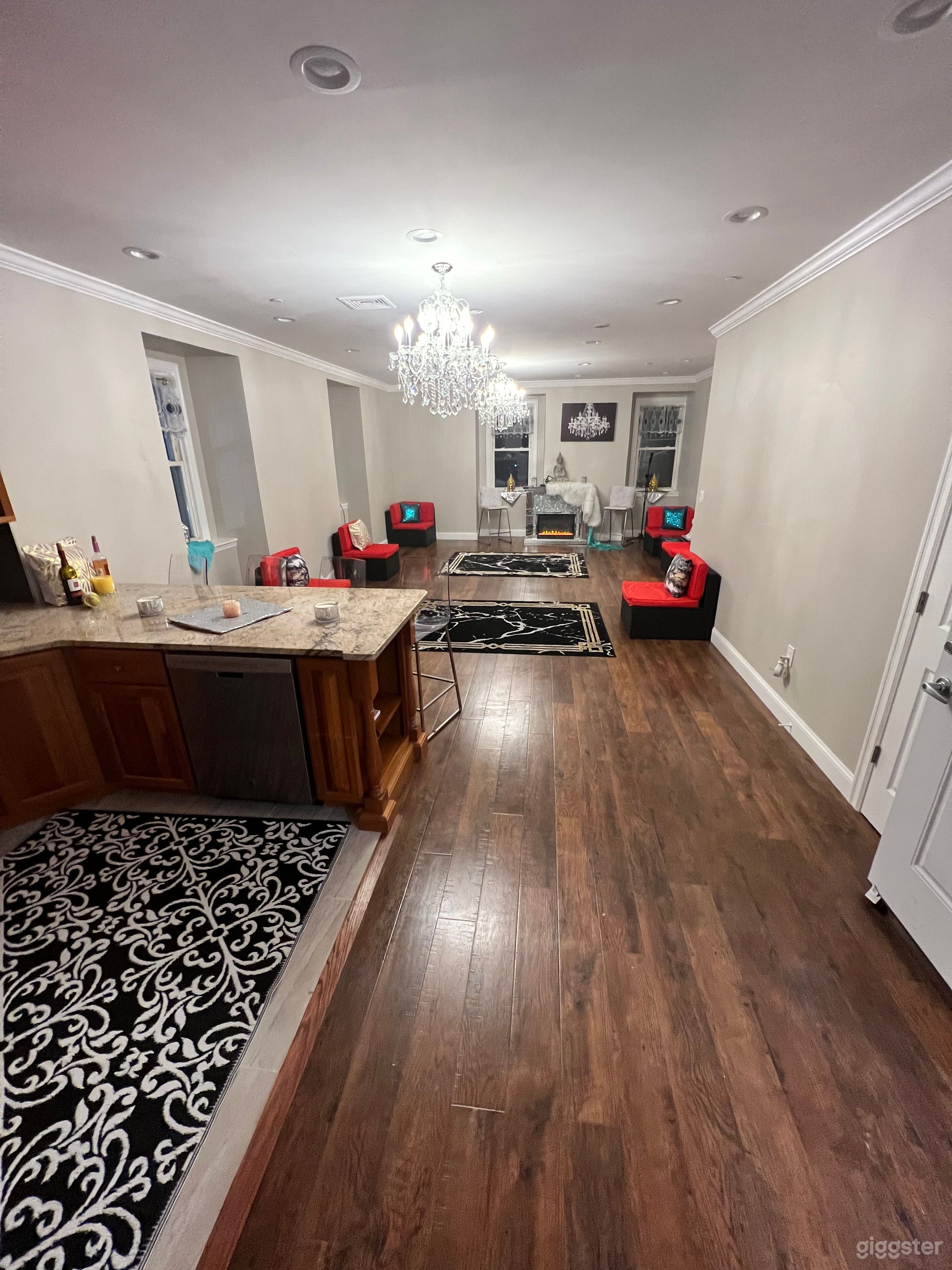 Open kitchen area can be used to create custom desert bar, food placement. Cakes can also go on fire place.