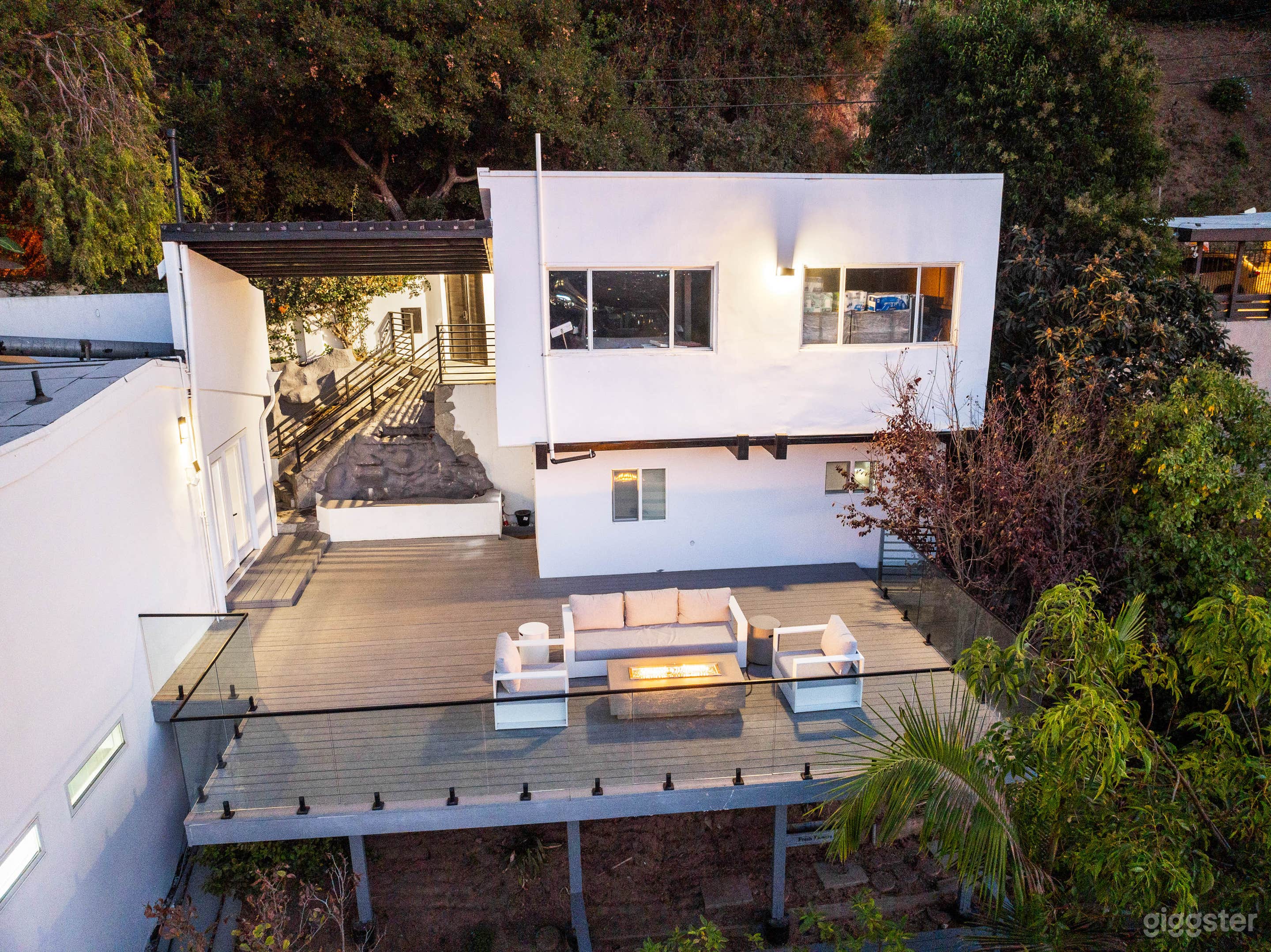 Overhead drone shot of the patio and guest room (1st floor located on the right hand side)