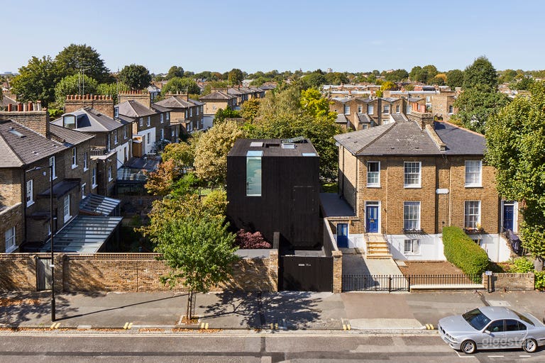  Front Exterior from the East - Facing West. 