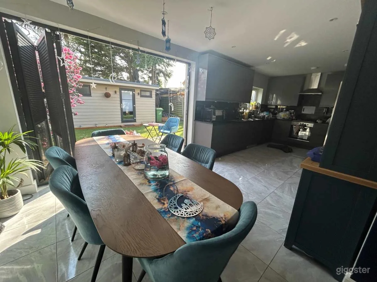 Modern Living and Dining Space with Large Garden Photo 1