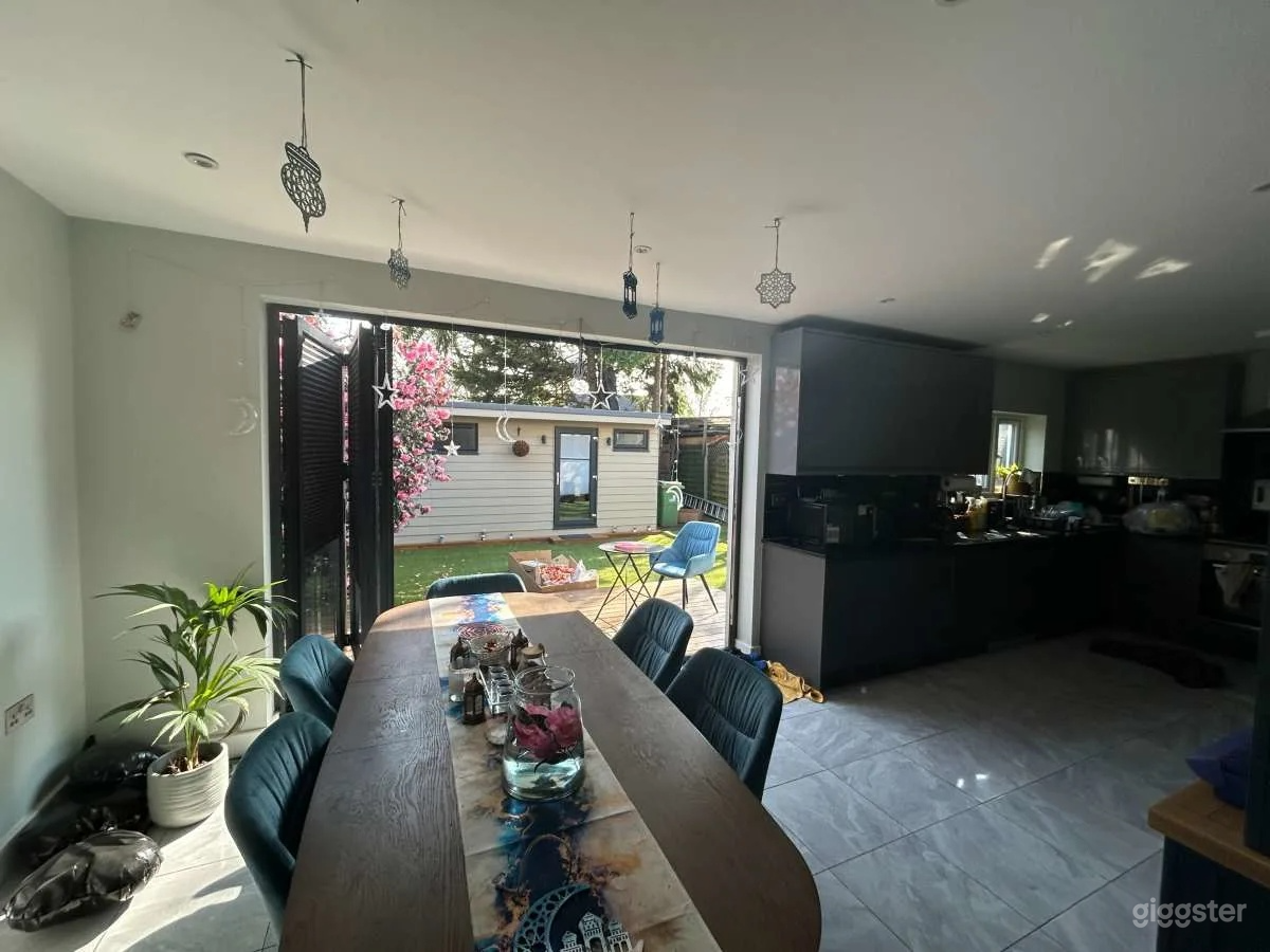 Modern Living and Dining Space with Large Garden Photo 2