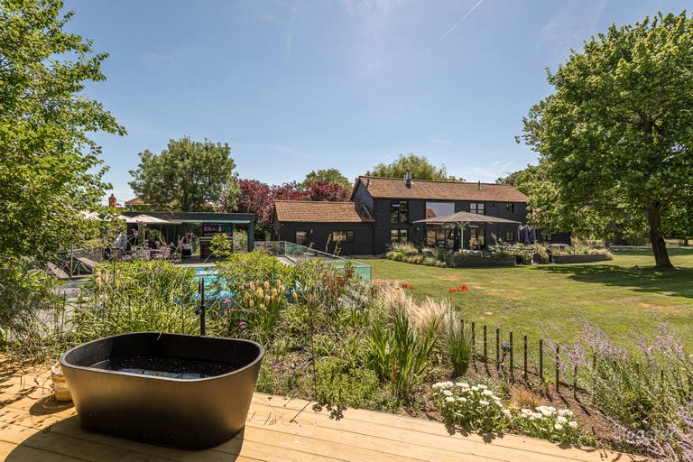  Stunning Black Barn Conversion With Extensive Grounds 