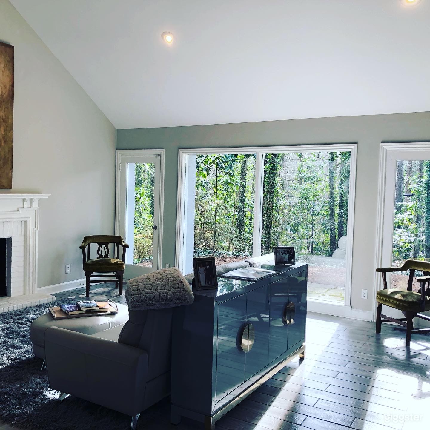 Formal living room with floor to ceiling glass.