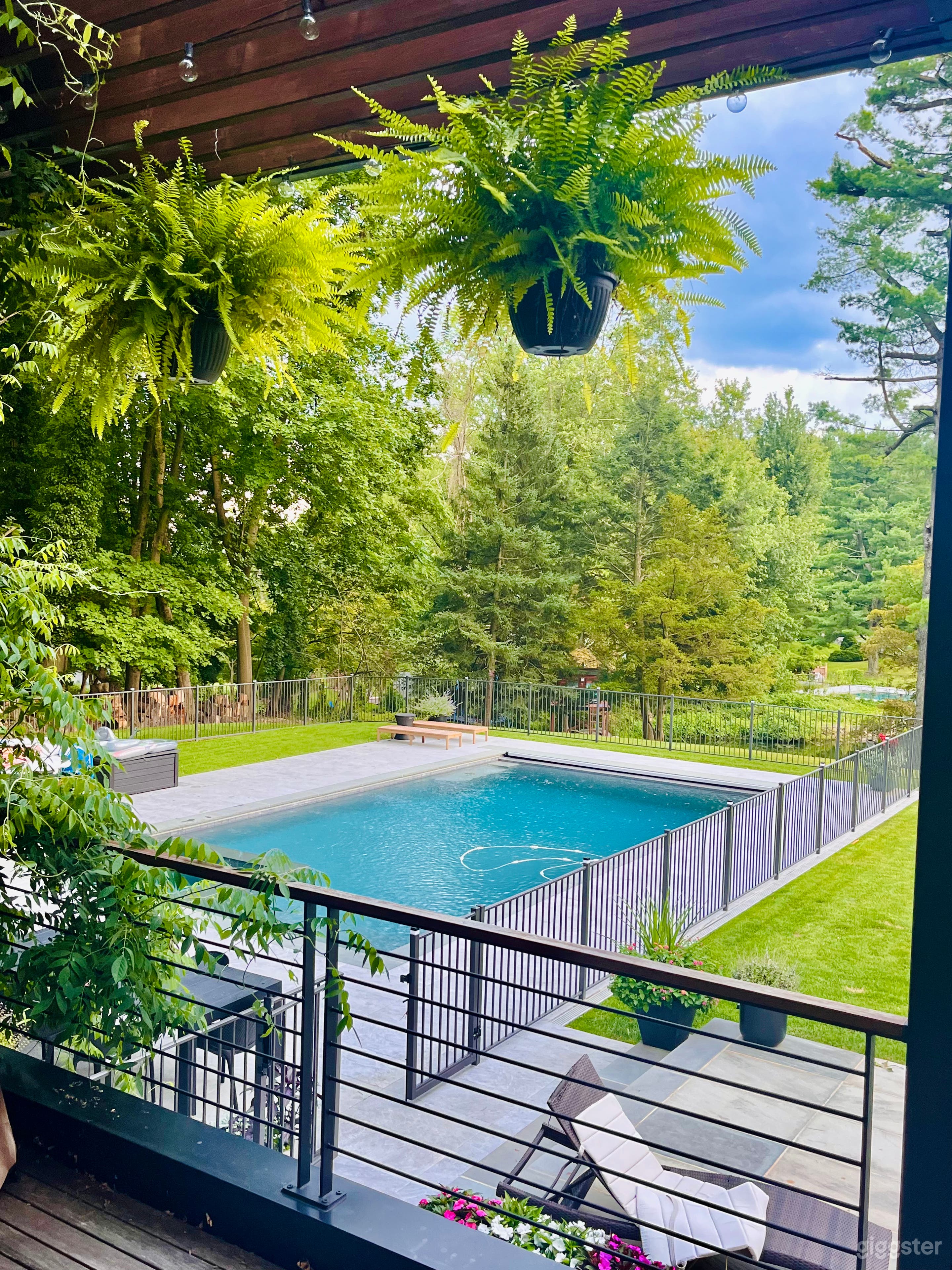 Modern Pool Overlooking Bucolic Pond Photo 1