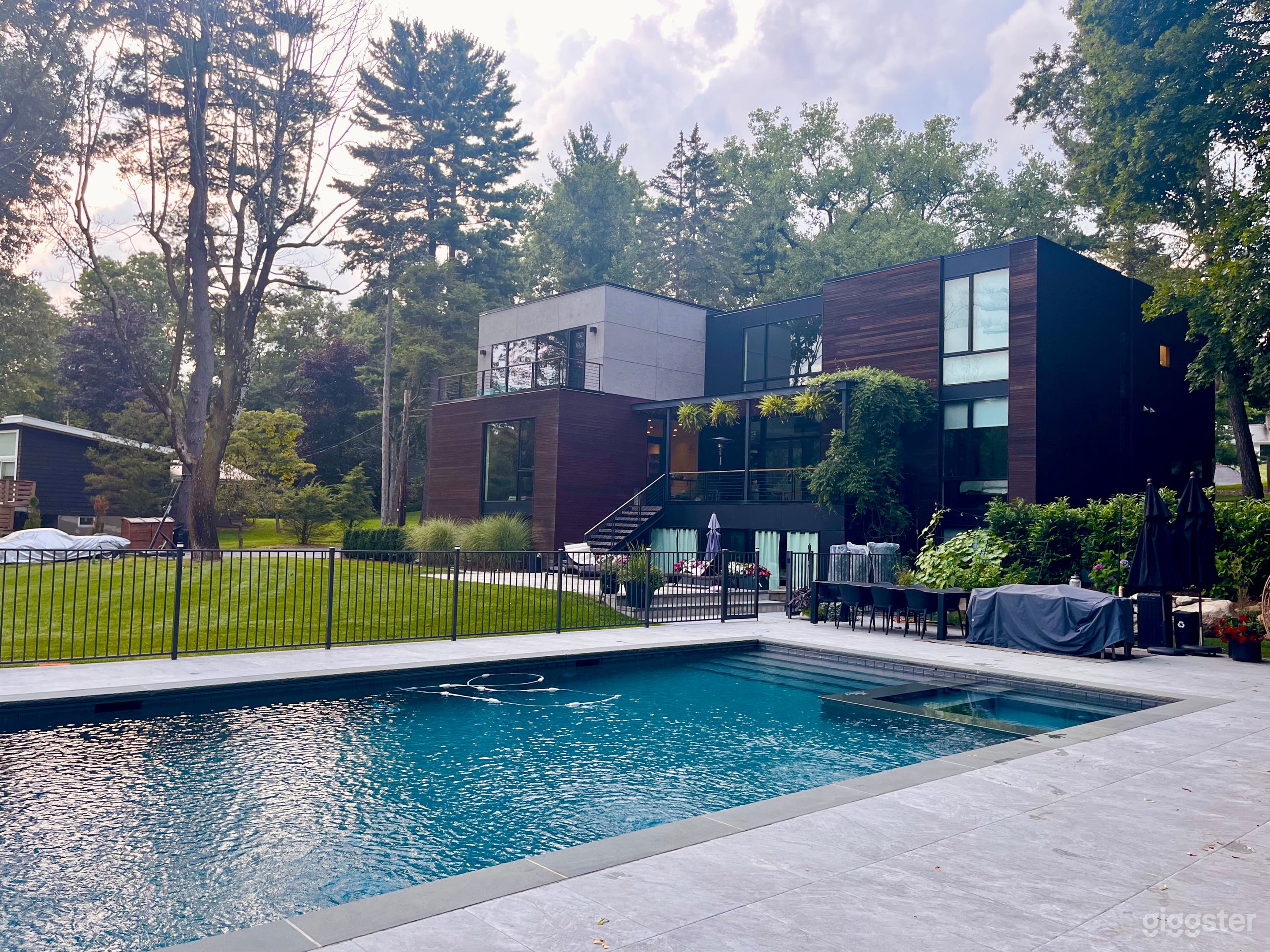 Modern Pool Overlooking Bucolic Pond Photo 4