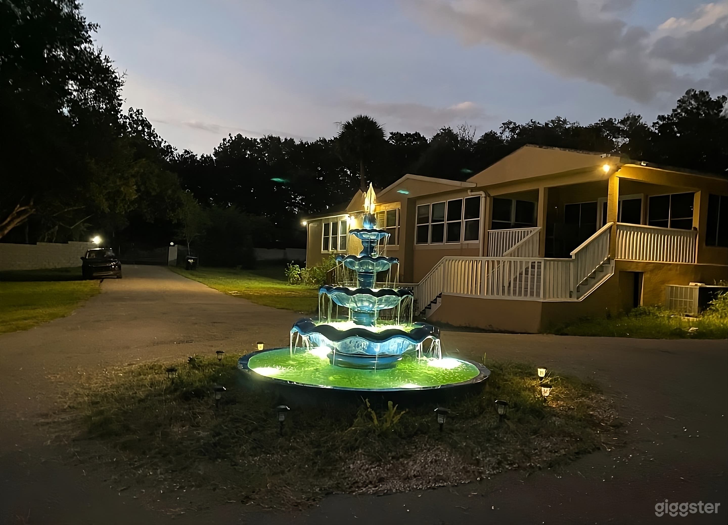 Spacious Backyard Featuring Fountain and Shady Oaks Photo 1