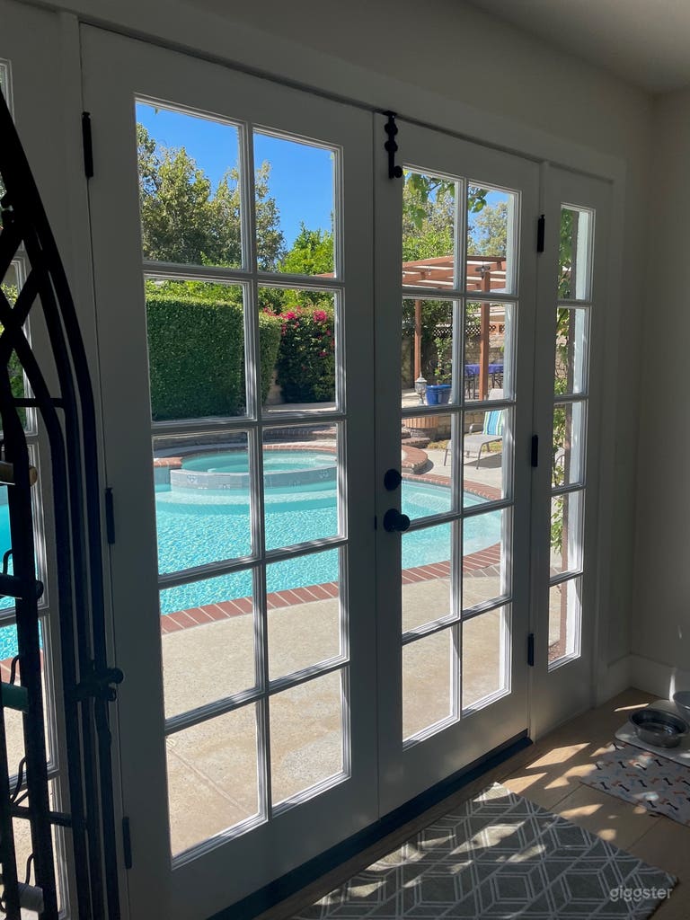  French doors open off the dining room to the pool. 