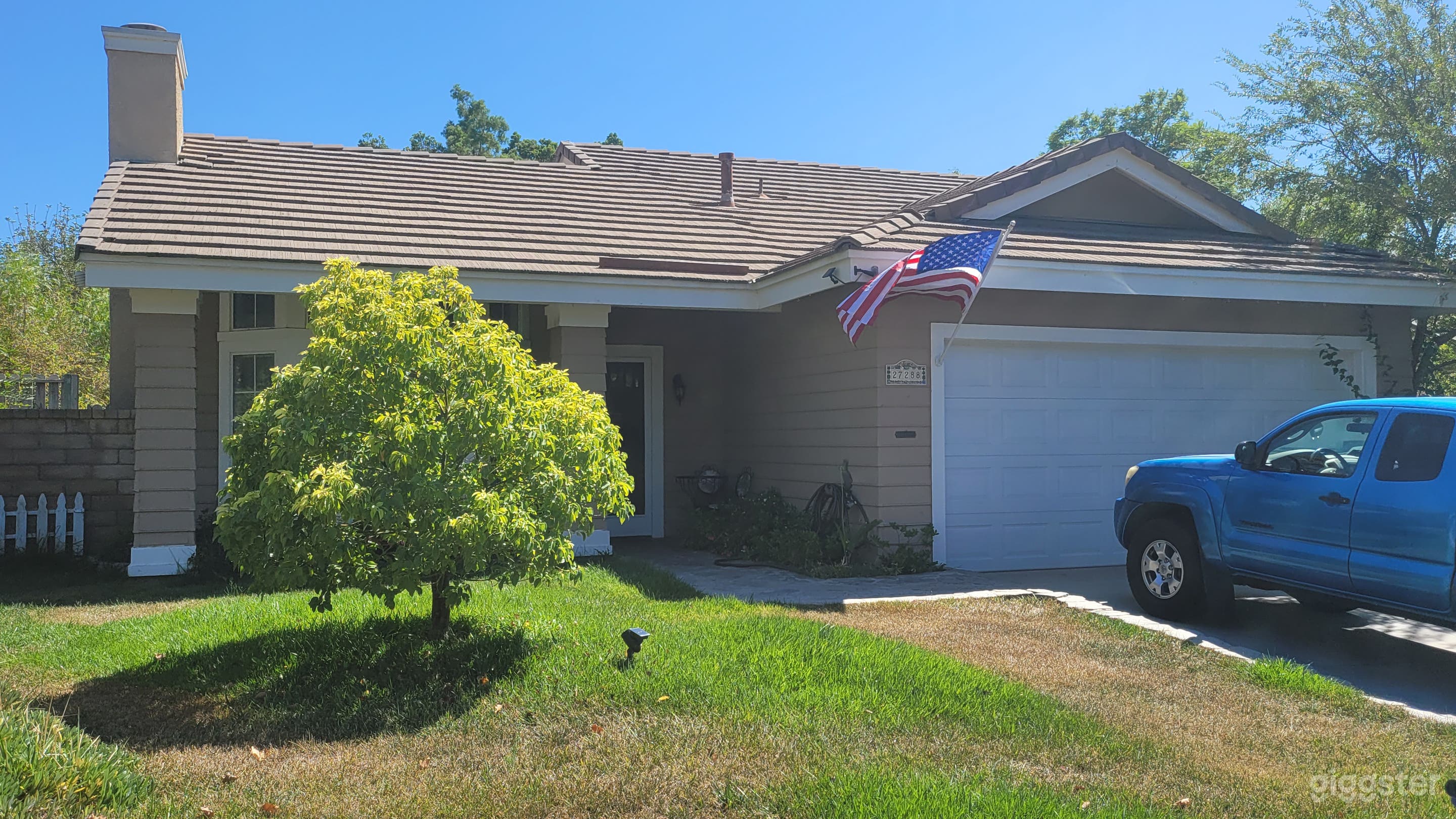 Front yard and entrance from the corner of our lot.2 car