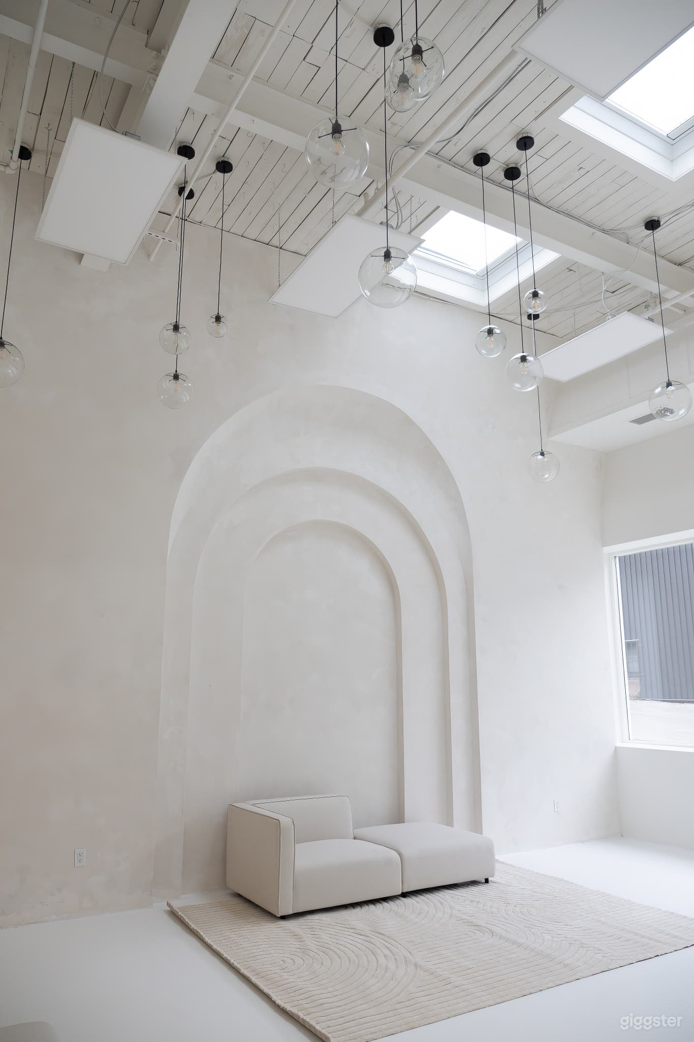 Textured Venetian wall with elegant arches and ambient lighting perfect for stunning photo shoots