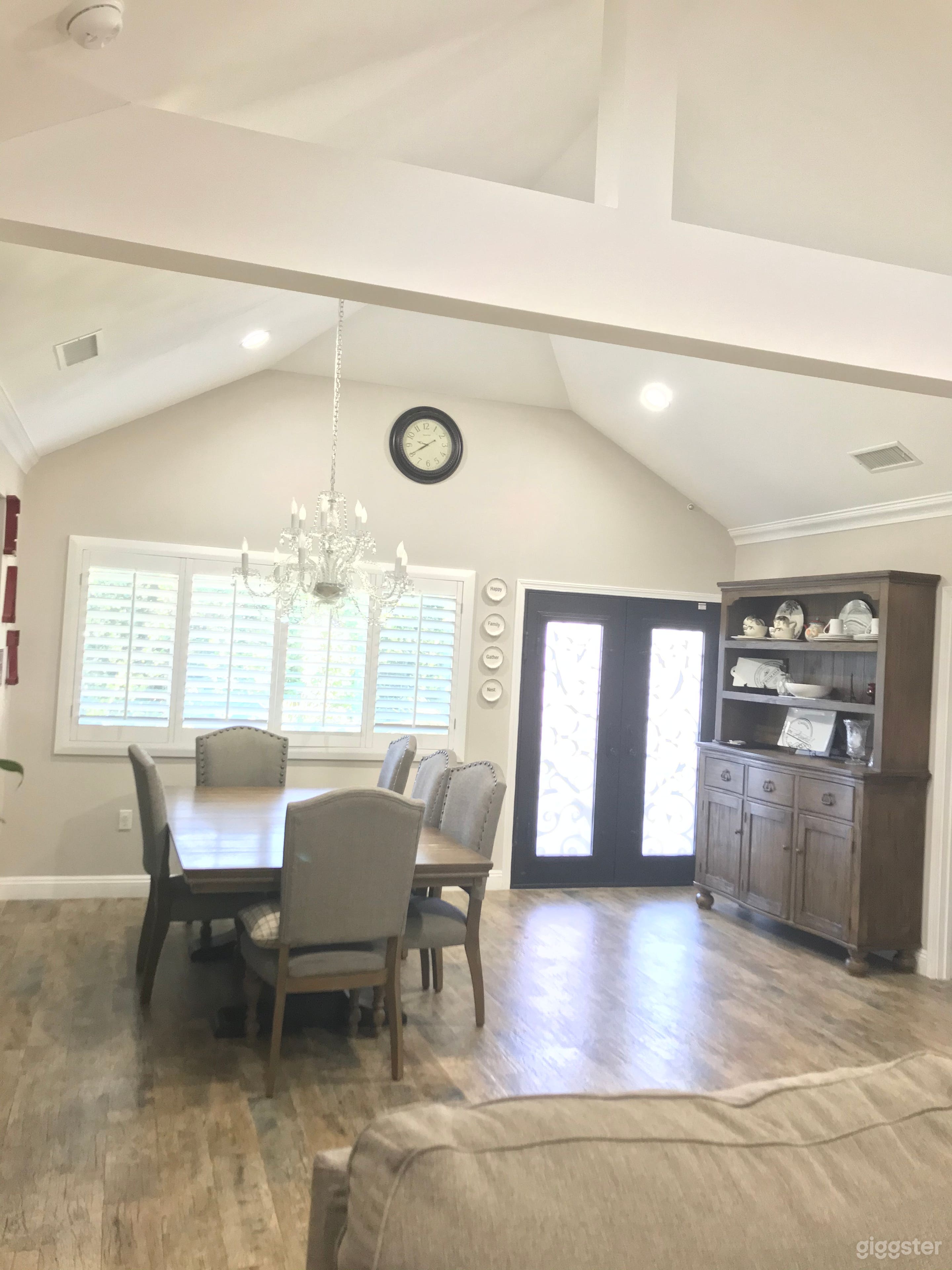 Dining Room Area with High Ceiling.